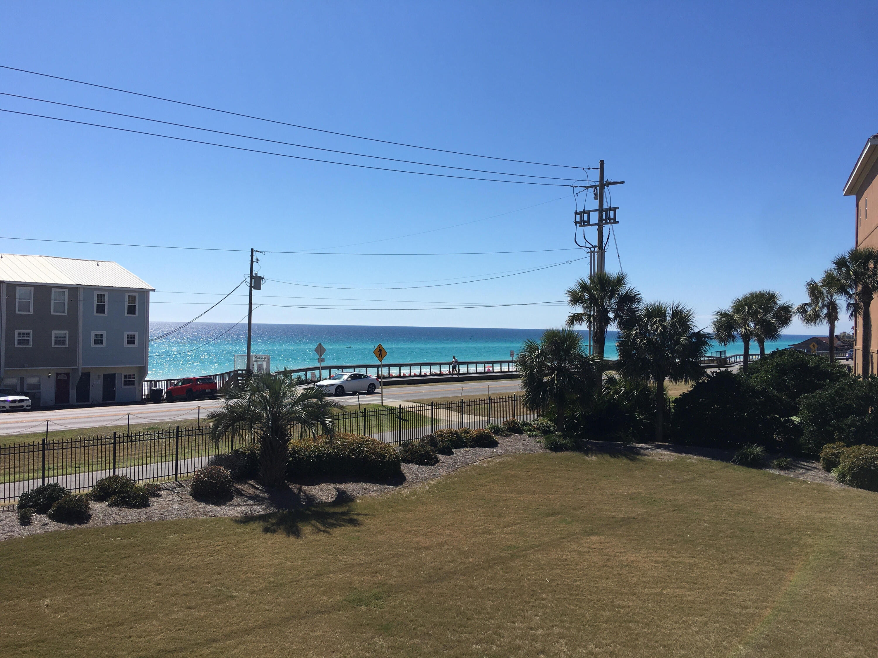 This lovely condo is your ticket to the fabulous beach lifestyle. Great view of the Gulf of Mexico from the balcony. One of the best views in the building. The beach access is right across the street from the condos. Located on the popular bike path on Scenic 98. Many fun restaurants and attractions in the area. Very stylish updating includes flooring, granite counters, and stainless appliances , Make vacation memories and you can also take advantage of lucrative short term rentals.  Tennis courts and pool are just a couple of the amenities available.  Buyer to verify all information.