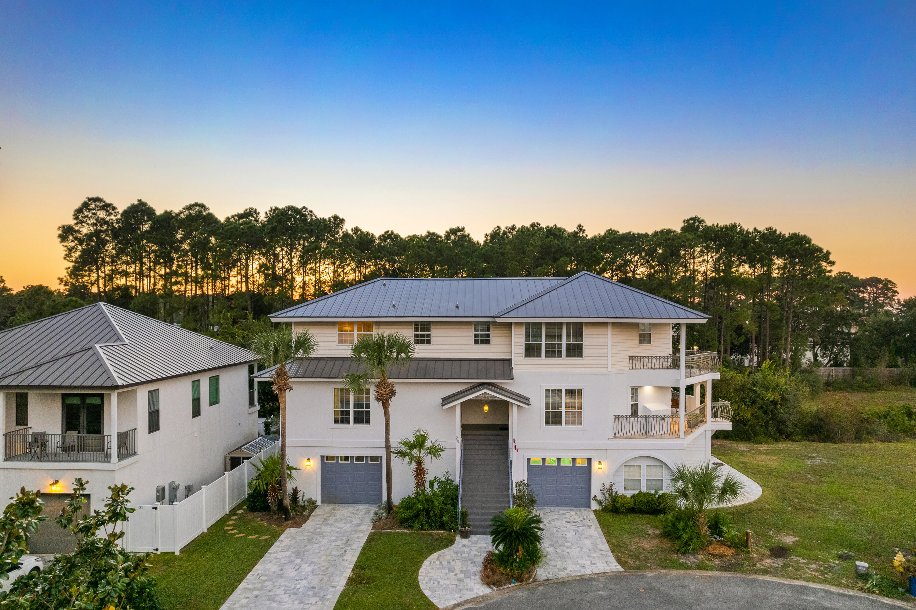 AMAZING OPPORTUNITY!! BAY VIEWS! Welcome to your dream oasis in the heart of Miramar Beach, Florida! 
SHORT GOLF CART RIDE TO THE BEACH AND HAS ITS OWN SLIP! 
This enchanting three-bedroom, four-bathroom haven is a true gem nestled on the bay. As you ascend the steps, you're greeted by the newly renovated living room and kitchen, bathed in natural light streaming through magnificent windows, casting a warm glow on the new gleaming floors. 
ASK FOR LIST OF UPDATES!! THERE ARE A TON! Inside, the master bathroom beckons with its luxurious soaking tub, inviting you to indulge in serene relaxation.
With a new roof overhead, this residence offers not just beauty, but also durability, ensuring your comfort in all seasons.
For the avid collector or hobbyist, there are two separate garages, providing ample space for your treasures and projects. The home is more than just a dwelling; it's a testament to meticulous care and affectionate upkeep, evident in every corner and detail.
Nestled within a close-knit community, this residence offers not just a house, but a vibrant lifestyle. Here, neighbors become friends, and every day is an opportunity for new adventures. So, whether you're basking in the sunlight on your porch, cruising the bay on your boat, or simply unwinding in the tranquility of your master bathroom, this Miramar Beach marvel promises a life of endless joy!
Seize the chance to call this haven your own and let the adventure begin!
MAKE THIS BAYVIEW HOME WITH BOAT SLIP ACCESS TRULY WATERFRONT!

  *BAY FRONT LOT IN FRONT AVAILABLE FOR PURCHASE F0R 335K AND COMES WITH ITS OWN BOAT SLIP AND TWO JETSKI FLOATS!* Lot is also .16 acres, all together the acreage is .33

*HVAC 2022 Water heater 2018 Roof 2023*