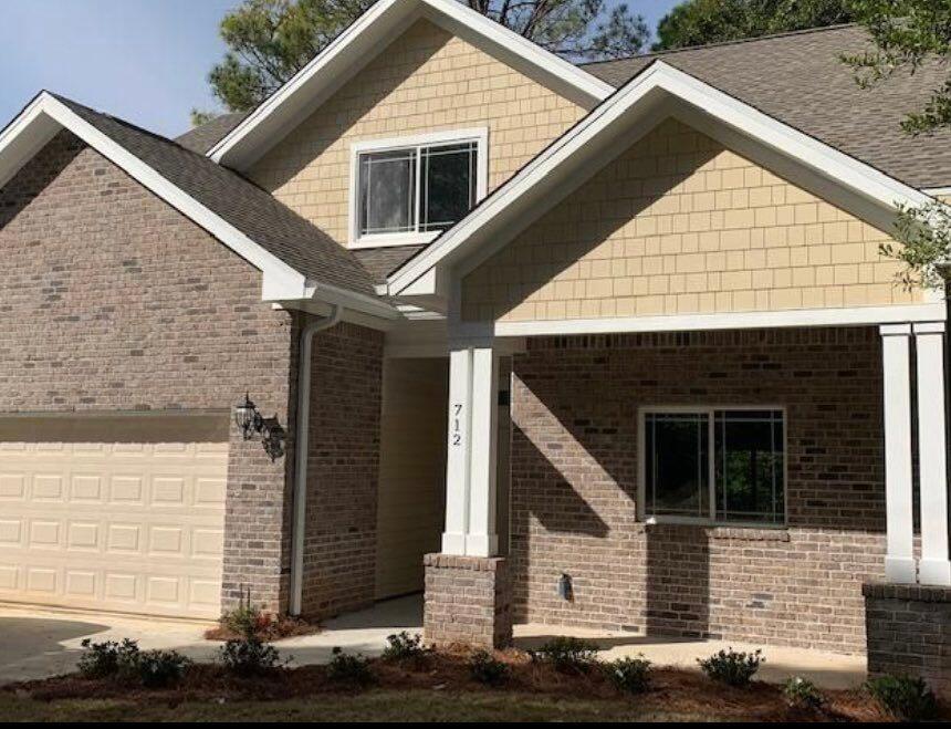 AVAILABLE... July 1, 2022. 4bd/3bth home with granite counter tops, breakfast bar, top of the line appliances, double stainless steel sink, tub sink in the Laundry Room, tiled shower enclosures (with seamless glass door), stone tile floors in the showers, wood cabinets, fenced in yard, & top of the line vinyl plank flooring The home also boasts a gas fireplace & stove. an open floor plan, 3 bedrooms upstairs, & the Master Bedroom on the first floor. Home is near Niceville High School. View over natural vegetation & a Creek. NO smoking. Pets allowed upon approval with a non-refundable pet fee.