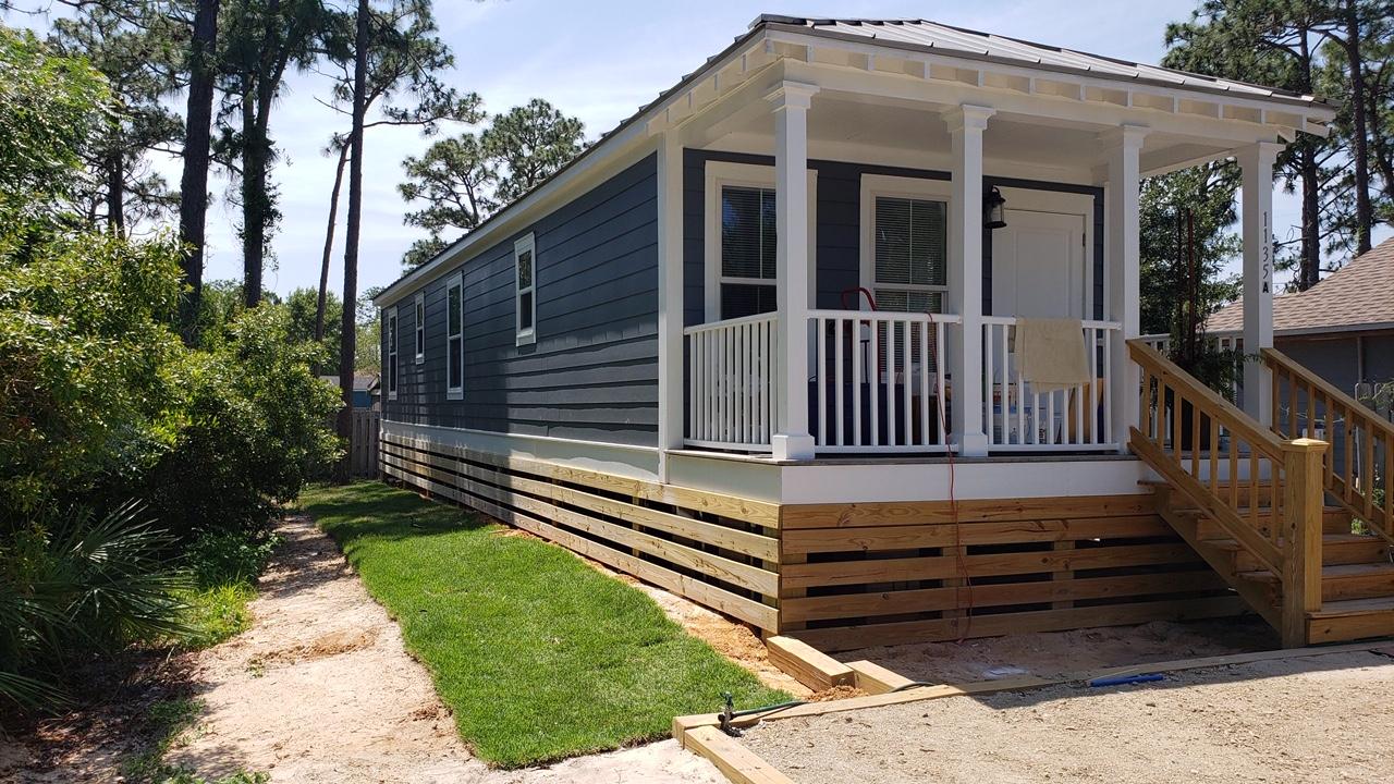 Cozy 2 bedroom, 1 bath Cottage with Covered Front Porch located in North Santa Rosa Beach. Home has Stainless Steel Appliances, Washer, Dryer and TV. Long term rental is Unfurnished and includes utilities. No Pets. Conveniently located. Close to Sacred Heart Hospital, Grand Blvd Restaurants & Shops and the beautiful Beaches on Hwy 30-A.