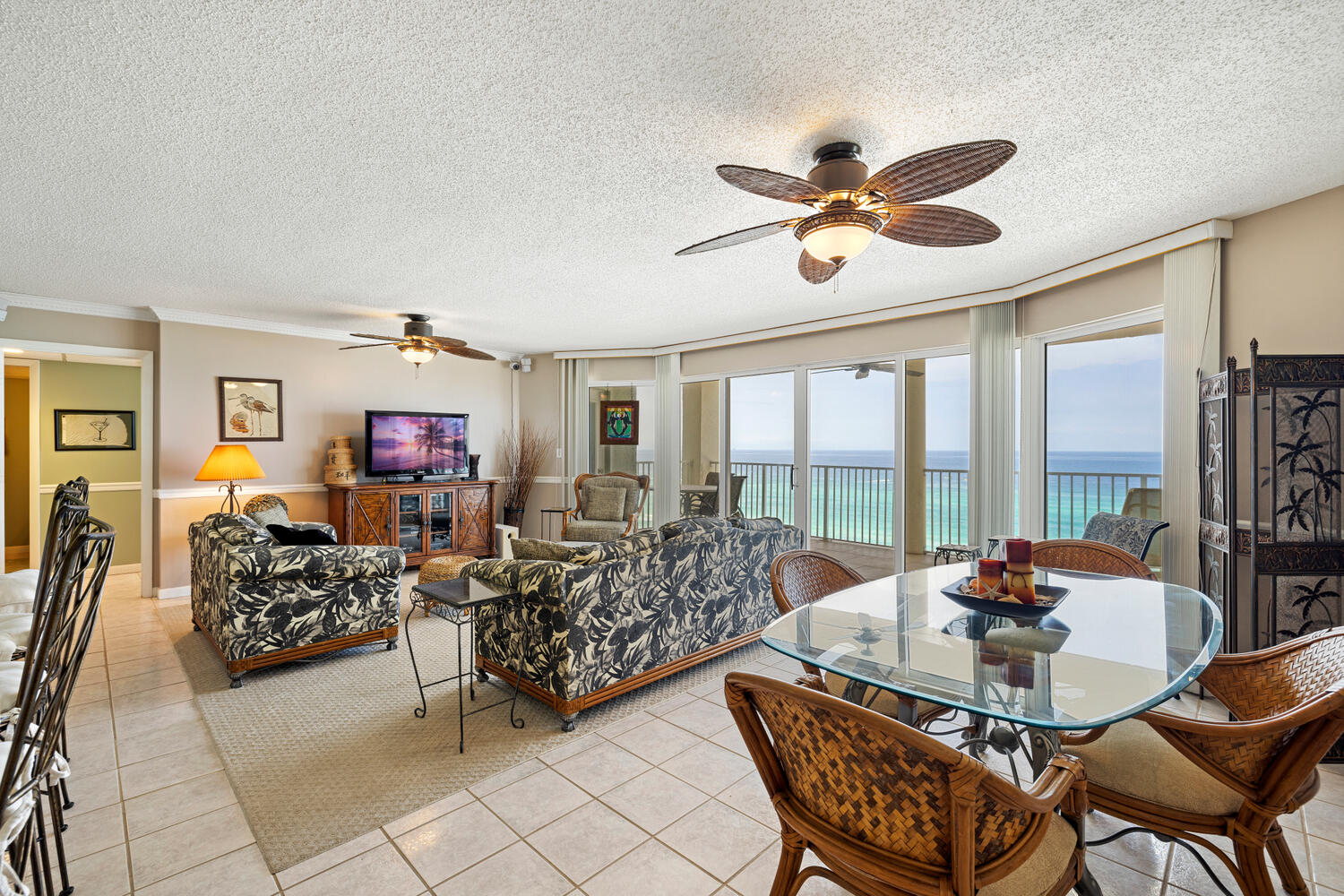 FULLY FURNISHED Stunning end unit with westerly sunset views. This FABULOUS 3 bedroom, 3 bathroom unit has many options for use-The 3rd bedroom has its own balcony and kitchenette and can be occupied or rented out separate from the rest of the condo. Use one, rent one, use both, rent both, you have options, rare options that few condo owners have on our beach. The living room and two of the bedrooms have striking 180% Gulf views. One of the bedrooms faces the sunset views overlooking the emerald green water. Two of the suites feature ceiling to floor glass, creating an extraordinary ambience. There are stunning gulf views from EVERY ROOM and EVERY ROOM has a balcony! Tastefully decorated, this unit is offered fully furnished and ready to rent or enjoy. The balcony has larger neutral tile floors. All bathrooms have garden style tubs/ with shower and dual sinks. The rental income for like kind units have been pushing 100k and this unit has not had the wear and tear of such units because it was used exclusively as a second home and is very well maintained. Long Beach Resort has a beautiful lagoon style pool with a center island featuring swaying palms and waterfalls. There are 2 additional pools at the resort and three whirlpools. The poolside Hangout Bar & Grill is convenient for grabbing lunch and drinks while enjoying the pool and gulf views. Gated community with 24 hour security. Come view this fantastic gulf front lock out unit where every bedroom has a balcony!