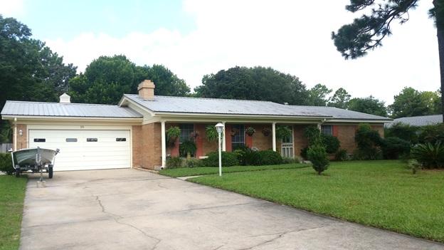 Looking for peaceful Florida Living? This Poquito Bayou home is just what you need! Mature trees with lush landscaping give this home perfect curb appeal. Step into the backyard and find yourself in a gardener's dream. Well established vegetable garden in a wide backyard with trees shading all around. After working around in the yard-take a break in the screened-in porch and hear nature's sounds. Home is centrally located with Eglin Air Force base and some of Florida's best schools at its fingertips. Enjoy the benefits of having a bayou-swim, fish, snorkel or just relax by using the boat launch with a dock. Had a long day? Use the all brick fireplace with a hearth and wood mantel or tinker around in the garage on the workshop bench to wind down. Perfectly kept, updated and move-in ready!