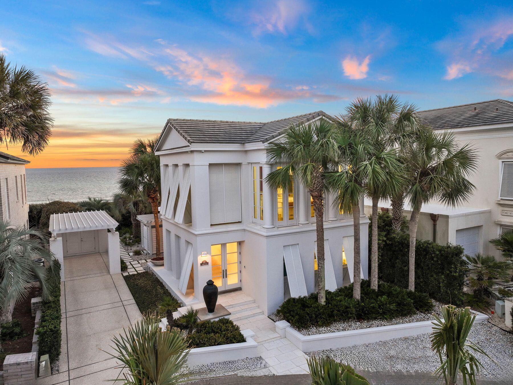Immerse yourself in the distinctive combination of 30A lifestyle and Mediterranean-inspired design with this exceptional residence. Nestled within a secure boutique community, this immaculate home boasts unobstructed gulf views complemented by charming shuttered windows. The discerning eye will be drawn to the expansive windows, Carrara marble floors, and the impressive 12 to 14-foot ceilings which create a peaceful atmosphere illuminated by abundant natural light. The home's open-concept living and dining areas are designed to provide panoramic vistas of the sparkling Gulf of Mexico, ensuring every moment at home is accompanied by breathtaking views. Even the office nook offers inspiring scenery, Step onto the expansive terrace and embrace the captivating vista of the white sandy beach from the second-floor elegant columned porch. The modern kitchen elevates entertaining with custom cabinets, sleek Cashmere stone countertops, and top-of-the-line Wolf and Sub-Zero appliances, including a butler's pantry and wet bar with a wine cooler. The center island with a lengthy breakfast bar exudes a casual ambiance, perfect for pre-dinner drinks and canapés.

The ground level is dedicated entirely to rest and relaxation, featuring two cozy guest bedrooms and a luxurious bathroom wrapped in gleaming marble. One of these guest havens offers the unique pleasure of a private outdoor shower. The highlight, however, is the spacious owner's suite, which impresses with wall-to-wall windows dressed in custom curtains, promising sunlit mornings with views from a secluded patio nestled against the dunes. The owner's bathroom is a sanctuary of elegance, with its Carrara marble floors and walls, a high-end spa shower, and a large vanity, all coming together to create a lavish retreat.

This prestigious villa is meticulously maintained, boasting a new HVAC system with state-of-the-art wi-fi thermostats, a dehumidifier, and fresh interior paint. Privacy and exclusivity await within the gated non-rental enclave, offering two swimming pools, including one adults-only, and a private beach walk-over. Additionally, a guest house is available for owners' personal use.

Ideally situated close to the vibrant communities of Seaside and WaterColor, with easy access to shopping, dining, and live entertainment, this residence defines luxury living in an exclusive 30A setting.