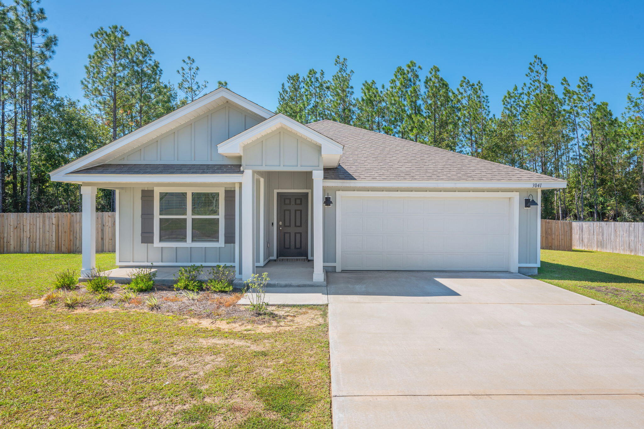 Nearly new and ready for you! This 4-bedroom, 2 bath home sits on a spacious .75 acre corner lot with a privacy-fenced yard—perfect for kids or pets to play. Inside, enjoy a modern open layout, fresh finishes, and the comfort of a newer build (less than 2 years old). A covered back porch overlooks the peaceful yard, offering the ideal spot to unwind after work. With a private feel, plenty of outdoor space, and a thoughtful floor plan, this home offers the best of both comfort and convenience. Heritage Plantation offers a community pool, great to gather & enjoy without the daily mantenance!