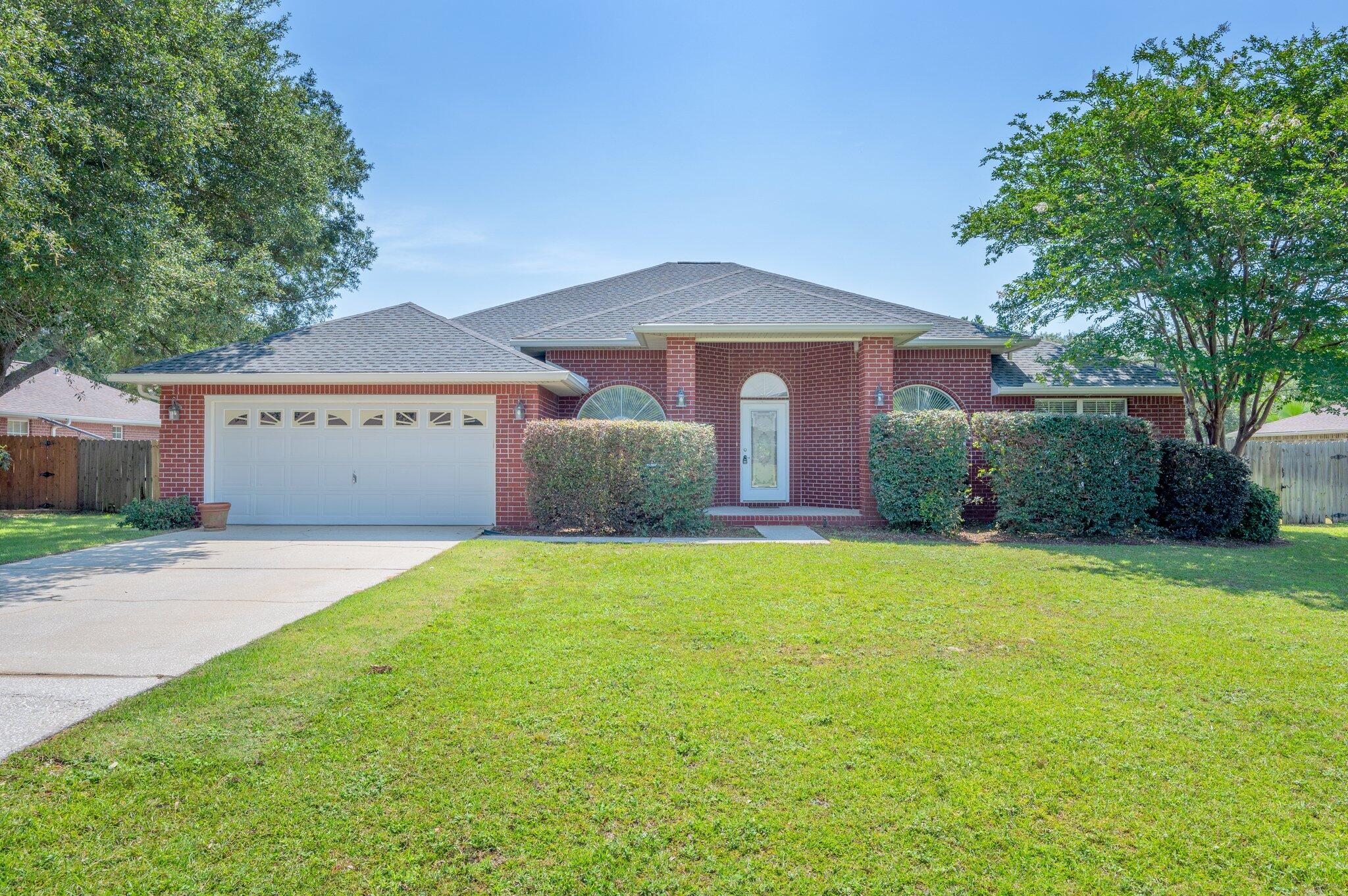 Welcome to this beautiful 4 bedroom, 3 bathroom home located in Navarre. This spacious house features an open and bright layout, perfect for entertaining guests or relaxing with family. Great gourmet kitchen is equipped with a double oven, ideal for cooking delicious meals and  loads of counter space! The garden tub in the bathroom provides a luxurious spot to unwind after a long day. With walk-in closets in each bedroom, there is plenty of storage space for all your belongings. HOA fees are paid by owner. This fine home is conveniently located for easy access to beaches, shopping and great restaurants as well as Pensacola and Ft. Walton Beach! . Don't miss out on the opportunity to make this house your new home!