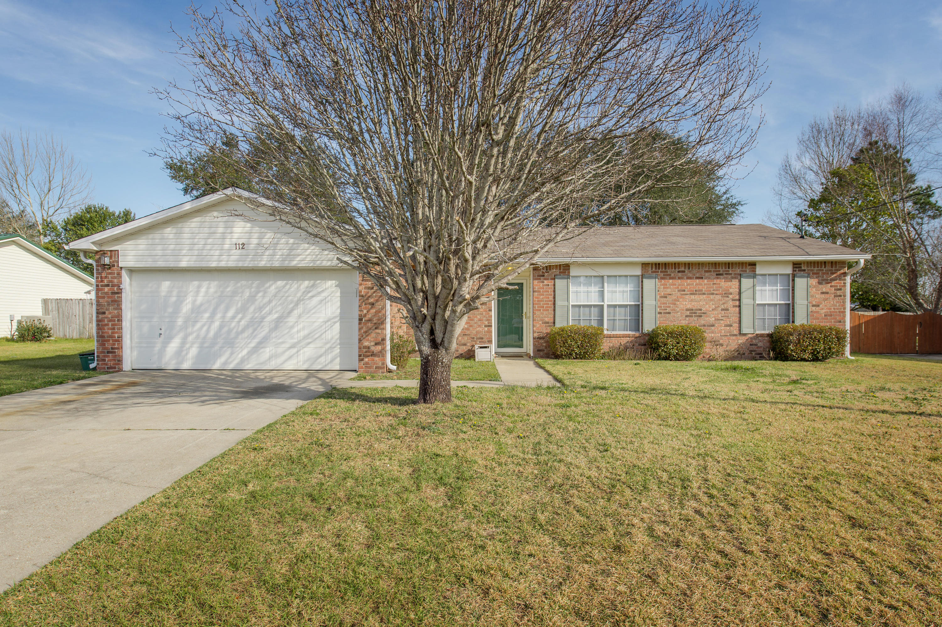 MOTIVATED SELLER for this charming 3-bedroom, 2-bath home in Crestview located on a cul-de-sac and nestled on a large 90x120 foot lot. The interior is in great condition with upgraded tile flooring in the main living area and new carpet in the master bedroom. There is a 2-car garage and large driveway with four spaces. Once you walk in you are greeted with beautiful cathedral ceilings enhancing the spacious feel of the living area. Enjoy the screened-in porch, which is a perfect place to relax, dine or take in the scenery. The backyard is fully fenced and very peaceful with mature oak trees. The home offers a split bedroom floor plan for privacy and a spacious master bedroom with a walk-in closet, great natural light and an en-suite bathroom with double vanities and soaking tub to unwind i