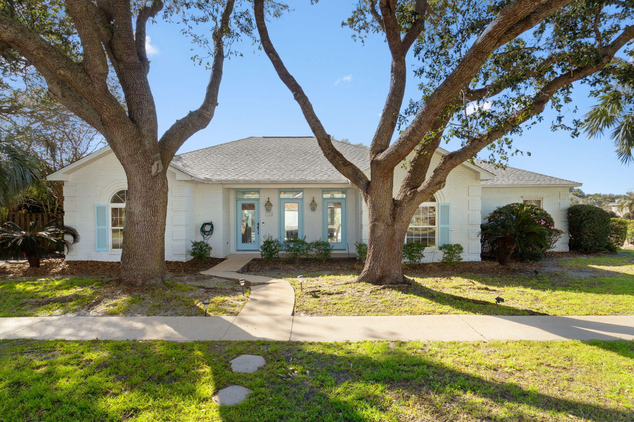 Welcome to the Florida lifestyle you've been dreaming of! Perfectly positioned on a corner lot with no HOA and a brand new March 2026 roof and 2020 water heater, this beautifully maintained 3 bedroom, 2.5 bath POOL home with a formal dining room offers comfort, convenience, and an unbeatable location in the heart of Destin. Enjoy the best of coastal living just minutes from Destin's world-famous white sand beaches. Even better, this neighborhood offers a sidewalk-lined path directly to the beach, making it an easy 8-minute walk or a quick 3-minute bike ride to TWO nearby public beach accesses!

Inside the home features new luxury vinyl plank flooring and upgraded lighting. The kitchen is equipped with granite countertops, upgraded stainless steel appliances, and ample cabinetry, making it perfect for everyday living or entertaining. Step outside to your private backyard oasis, complete with a fenced yard and sparkling pool - perfect for relaxing after a beach day or hosting friends and family!

Additional highlights include:
- Brand new roof (March 2026)
- 2020 water heater
- 2018 HVAC system
- 2024 pool pump
- 2020 well pump 
- Tesla charger installed in the garage

With its prime location walking distance to the beach and just minutes from the best of Destin shopping, thoughtful upgrades, and private pool, this home offers the perfect combination of coastal charm and everyday convenience. Welcome home to paradise!