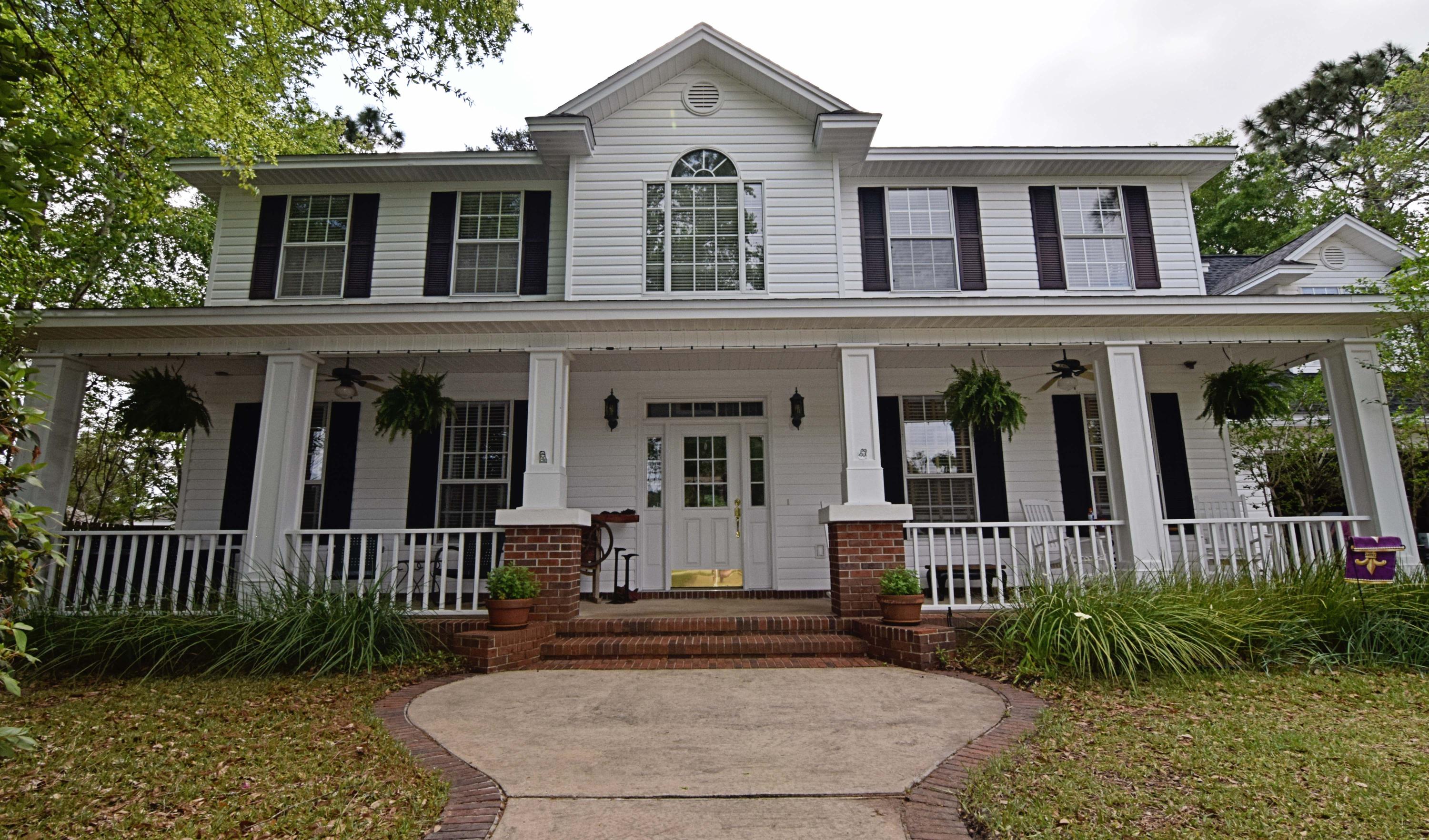 Live your dream in this spacious southern charmer located in Rocky Bayou Estates. Front and back porches and mature trees anchor this beautiful custom Randy Wise home set on one of the largest lots in the subdivision. The eat-in kitchen with granite countertops and tumbled marble backsplash opens into the family room complete with fireplace and large windows. Separate formal dining room and living room/office provide multiple living areas. Large bedrooms, walk-in closets, a huge bonus room and double staircases are hallmarks of the custom features that set this home apart from the rest. Large utility room has space for that extra refrigerator or freezer and roof was new in 2014. You need to see this one!