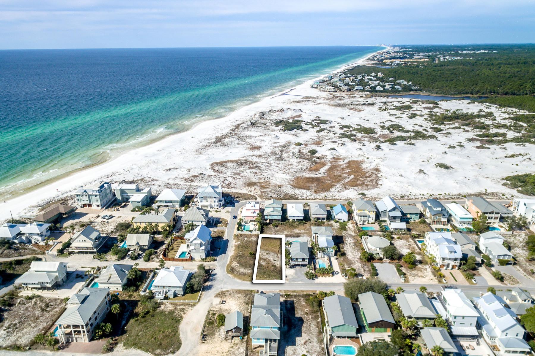 One of the few remaining opportunities to build your dream home in beautiful Grayton Beach. This lot will have spectacular and forever views of both the gulf and stunning dune system of Grayton State Park.
The town of Grayton Beach is surrounded by Grayton State Park, Western Lake and the Gulf of Mexico. You may enjoy it's stunning beaches, bike riding, fishing, boating or boarding on Western Lake and it's fantastic restaurants & boutiques.