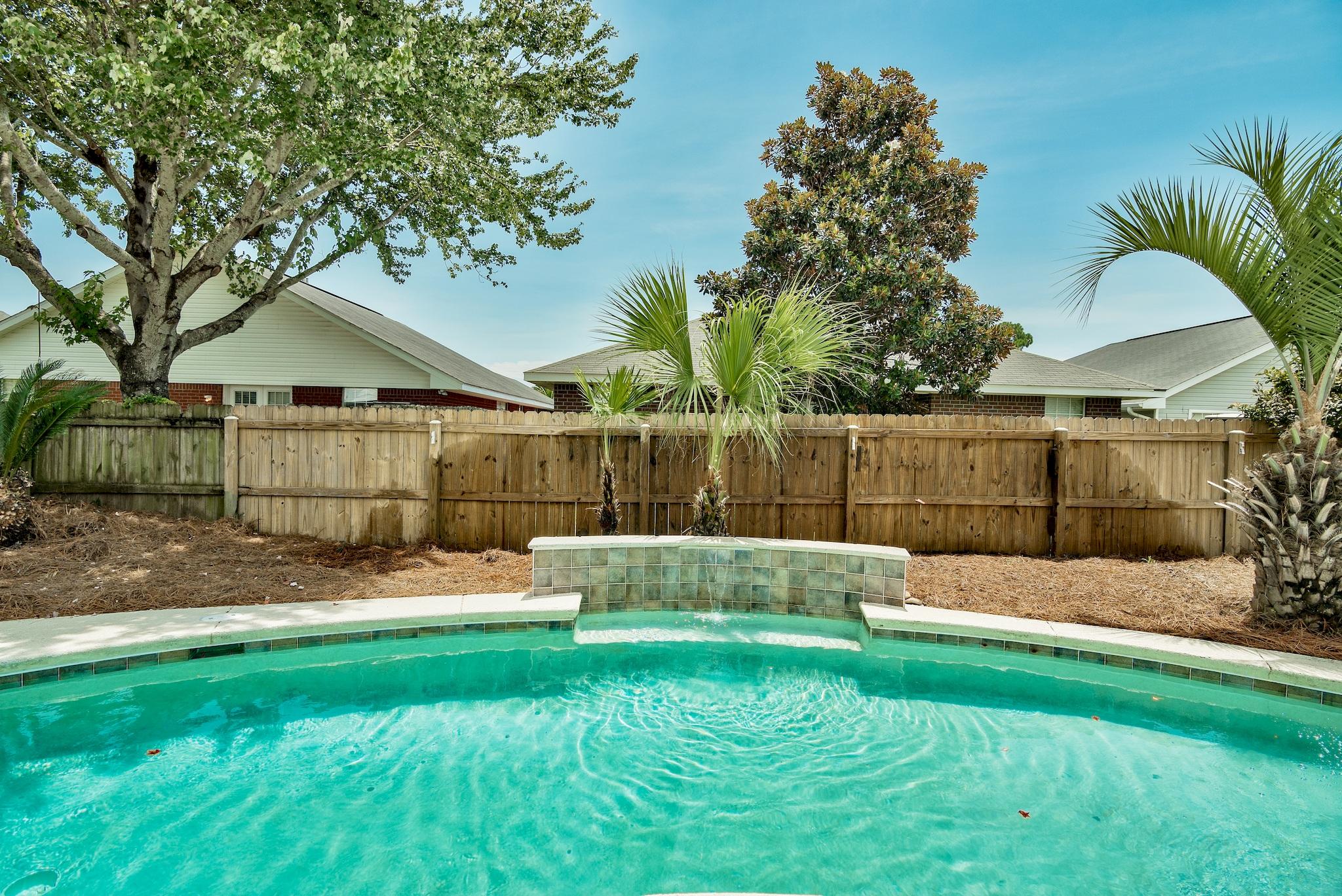 Opportunity Knocks in Desirable Emerald Village! BEST PRICED HOME IN THE COMMUNITY & THE ONLY ONE on the Market with a POOL!!!! Beautifully Updated One Story Home with 2 Car Garage & 3 Split-Bedroom Plan & 2 Bathrooms. The sellers have recently done countless UPDATES & UPGRADES to have this home completely Move-In Ready for You!!! Painted, New Stainless Steel Appliances, Granite Countertops, Sinks, Fixtures, Some New Lighting, New Plank Wood Laminate Flooring & New Carpet, & updated Landscaping... the list goes on! This home offers a peaceful environment with a fresh color pallet of whites and blue-grays! Looking for outdoor relaxation & fun, Step outside to Your Own Beautiful Pool Oasis with Waterfall Feature Wall! Centrally Located Close to Military Bases, Schools, Shopping & Dining!!! Open Layout with no Wasted Space makes this home feel much larger. There is a designated formal Dining Area when you enter the home that could also be used as a Office or Bonus area. The Master Bedroom is Spacious and offers an en suite Master Bathroom with Double Vanity and a Spacious Walk-in Closet & Additional Linen Closet. The Master Suite has been enhanced with New Carpet & New Tile in the Master Bathroom, as well as a New Granite, New Sinks & Faucets with LED Light Feature, and New Comfort Height Toilet. The other two Bedrooms are located on the opposite side of the home with convenient access to the bathroom in between them. Both additional Bedrooms also feature New Carpet. It's Warm in Florida so you will appreciate the interior Laundry Room with Added Storage Space. Kitchen also offers a pantry. Home Offers additional Storage Space in the attic above the garage and an exterior storage unit in the back yard. There is also a well-sized screened porch off the back of the home, giving a perfect out-door living space for you to enjoy. Located in the X Flood Zone - So No Required Flood Insurance needed. Liz Jackson Preparatory School is also an Option for K-8th Grade, located only 2 miles away from the home. This home is Truly Superb.... Don't Wait, call your Realtor Today!