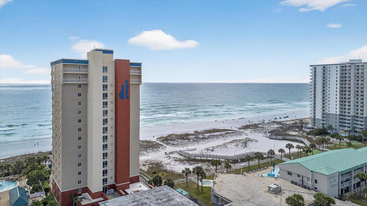 This PENTHOUSE ocean view condo will take your breath away! Relax on the expansive private balcony located directly on the beach, offering stunning panoramic views of the Gulf, where you can enjoy everything from dolphins swimming offshore to unforgettable sunrises and sunsets—all in the heart of Destin.

This corner penthouse on the 16th floor features 2 bedrooms and 2 baths with over 1,300 square feet of living space.  The open living and dining areas flow seamlessly to the balcony, creating the perfect indoor-outdoor living experience. The kitchen is fully equipped with granite countertops, stainless-steel appliances, and all the essentials for cooking and entertaining. 

The Gulf-front primary suite includes direct balcony access and an en-suite bath with a jetted soaking tub and separate glass-enclosed shower. The guest bedroom offers flexible sleeping arrangements with direct access to the guest bath.
All furnishings convey with sale.

Destin Towers amenities include a community pool, hot tub, tennis court, grilling area, high-speed internet, and gated beach access. Conveniently located across from Big Kahuna Water Park and just minutes from shopping, dining, and Destin's top attractions. Ideal as a primary residence, second home, or vacation rental.