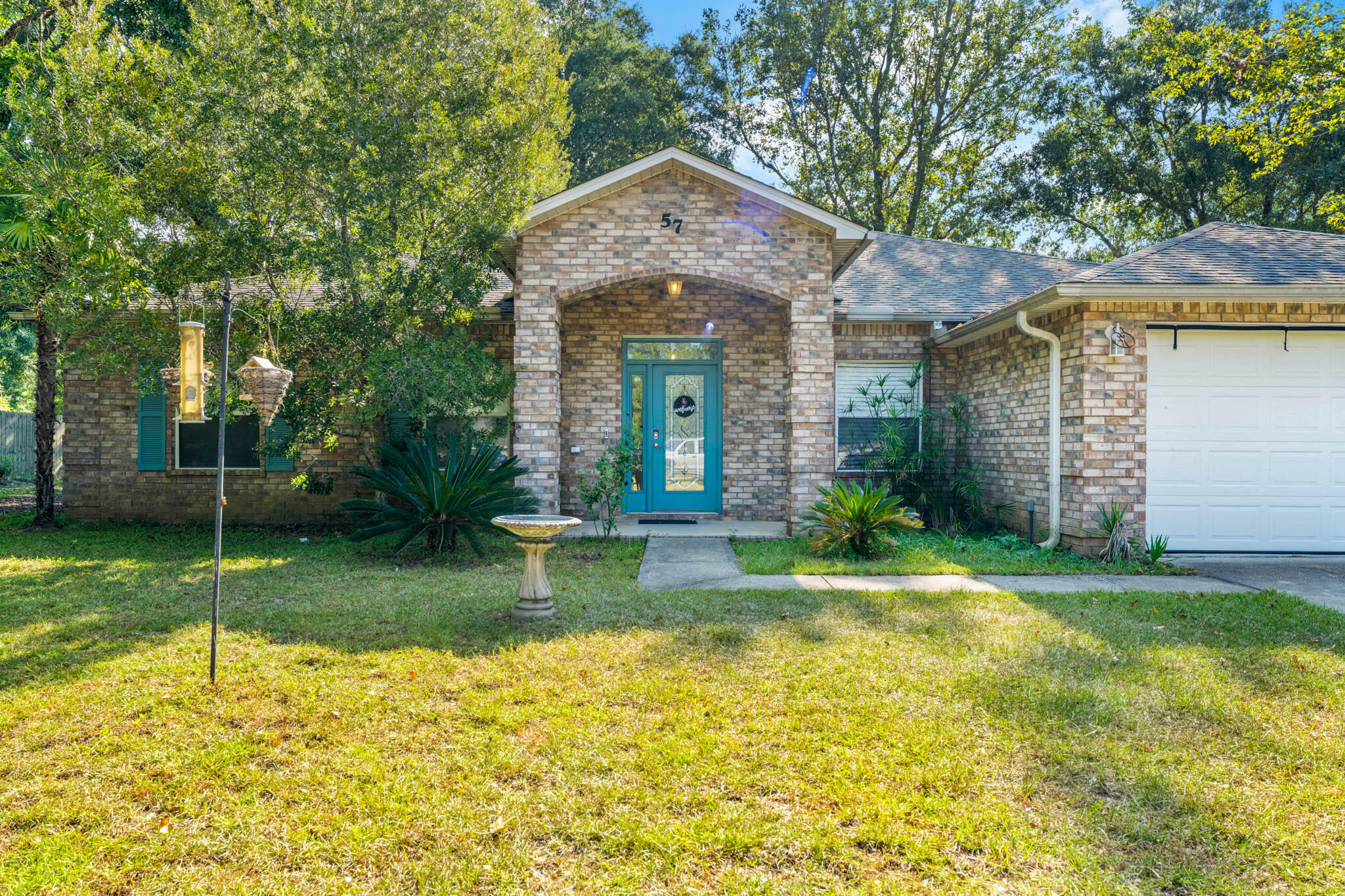 Subject to lender approval--this property is being offered as a short sale. Welcome to 57 S Pleasant Drive -- a spacious 4-bedroom, 2-bath brick home in the desirable Pleasant Ridge Estates.

Set on a generous half-acre lot, this 2,110 sq ft residence features a split floor plan designed for both comfort and functionality. The solid brick exterior provides timeless curb appeal, while the 2-car garage adds convenience with secure parking and extra storage.

Inside, you're welcomed by a sitting area adjacent to the foyer, perfect for relaxing or greeting guests. The home also offers a flexible 4th bedroom that can double as an office, giving you options to fit your lifestyle. The heart of the home is the open-concept kitchen and living area, where a breakfast bar, abundant counter space, and ample cabinetry make cooking and entertaining effortless. A formal dining room provides the ideal setting for family meals or special occasions.

The large master suite is a true retreat, complete with a spacious bath and private access to the back patio. The laundry room is thoughtfully designed with ample shelving and storage and features a direct entryway from the garage for everyday ease.

Outdoors, the expansive .50-acre lot offers endless possibilities  from adding a pool or garden to creating outdoor entertaining areas. The generous yard ensures both privacy and space to spread out.

Located in Pleasant Ridge Estates, the neighborhood has an HOA feel without the fees  offering well-kept surroundings, a peaceful atmosphere, and the convenience of being close to schools, shopping, and local amenities.

57 S Pleasant Drive is ready to welcome you home  offering comfort, space, and the flexibility to fit your lifestyle.