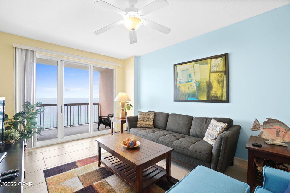 Sunrise Beach unit 1803 is the beach getaway that you have been dreaming of! Super-efficient floorplan, this oversized 2 bedroom + bunkroom, 2 bath gulf front condo lives like a true 3 bedroom and sleeps 8! It also has a PRIME upper floor location in the deluxe 25-story Gulf front complex, offering huge east to west Gulf views from the kitchen, dining, and living area! This ultra clean, meticulously maintained, turnkey offering offers all of the extras and is tiled in common areas and will convey fully furnished and rental ready. Interior features include a spacious and open floor plan with raised ceilings. The gourmet kitchen is fully equipped. Master bedroom is Gulf front with balcony access.