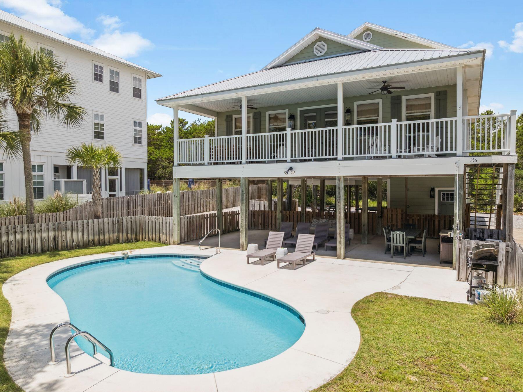 Gulf Trace is a highly sought-after, established community on the south side of 30A, known for its spacious lots. A beautifully renovated home features four spacious bedrooms, including added bunk beds to comfortably accommodate additional guests. Thoughtfully designed by one of the owners—an interior designer—it offers a warm and welcoming retreat after a day on the white sand and emerald waters. The open concept living, dining, and kitchen area is enhanced by a vaulted wood ceiling, creating a cozy, coastal ambiance, while the large private pool adds the perfect touch for relaxation and fun The first level includes a functional mudroom and laundry area—perfect for storing beach gear or day-to-day essentials. Easy Parking for 5 vehicles Upstairs on the second level, the main living area impresses with vaulted ceilings, abundant natural light, and a calming palette of soft greens. The spacious kitchen and dining area are well-suited for hosting, with seating for ten and additional space at the peninsula. A large balcony off the living room offers views of the pool and cool coastal breezes. The home offers four well-appointed bedrooms across the second and third floors, each with its own en-suite bathroom, creating an ideal layout for families or guests. Whether you're looking for a primary residence, second home, or investment property, this home combines thoughtful design, quality finishes, and an exceptional location in one of 30A's most beloved beach communities."