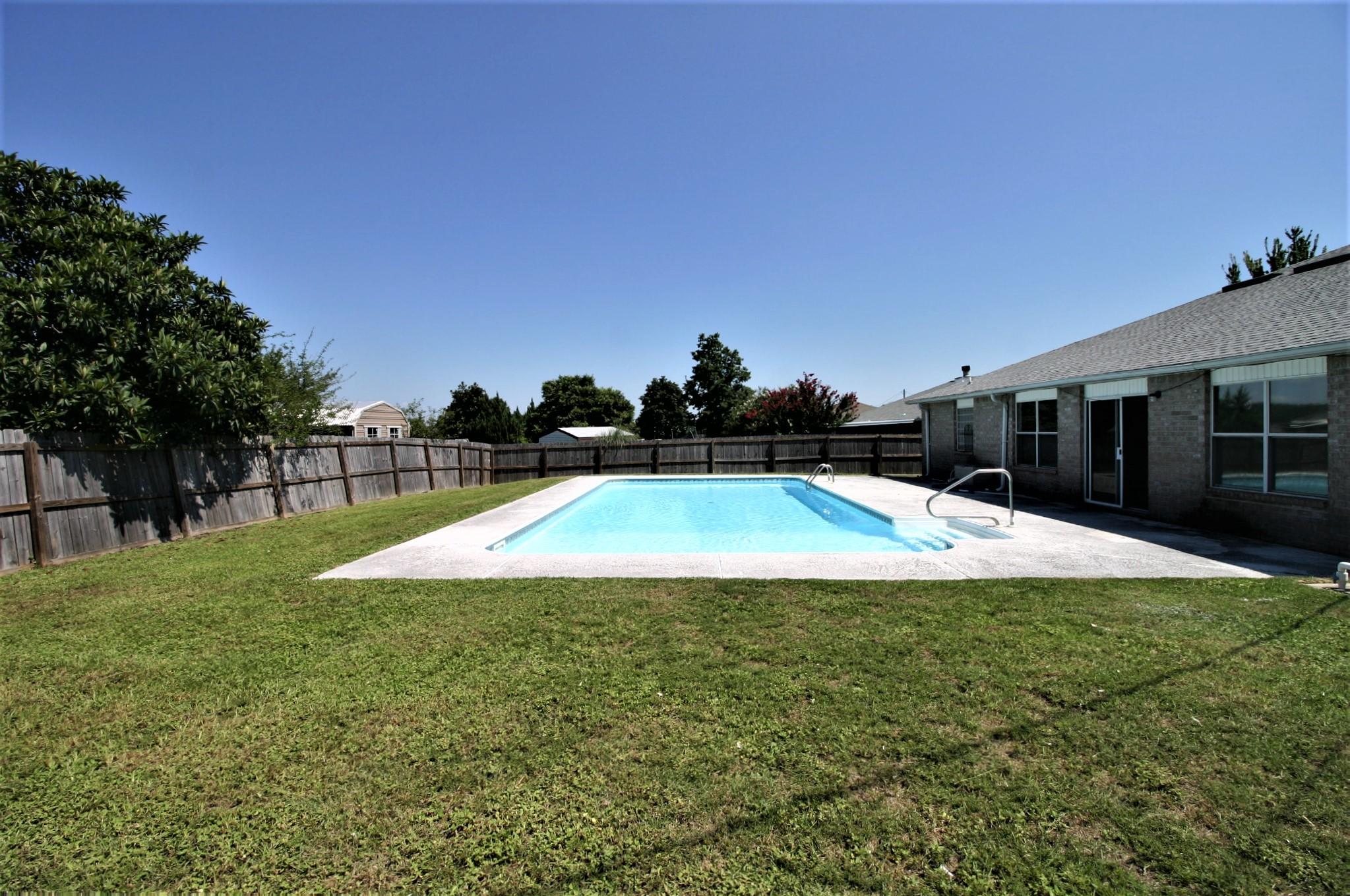 Put on your running shoes if you want to see this great 4 bedroom home in south Crestview!  This one has lots to offer with a sparkling in-ground pool, all new flooring and paint throughout, new granite in kitchens and bathrooms - all on a great corner lot! Roof and HVAC replaced within the last few years, so no major worries here! Make your appointment today!