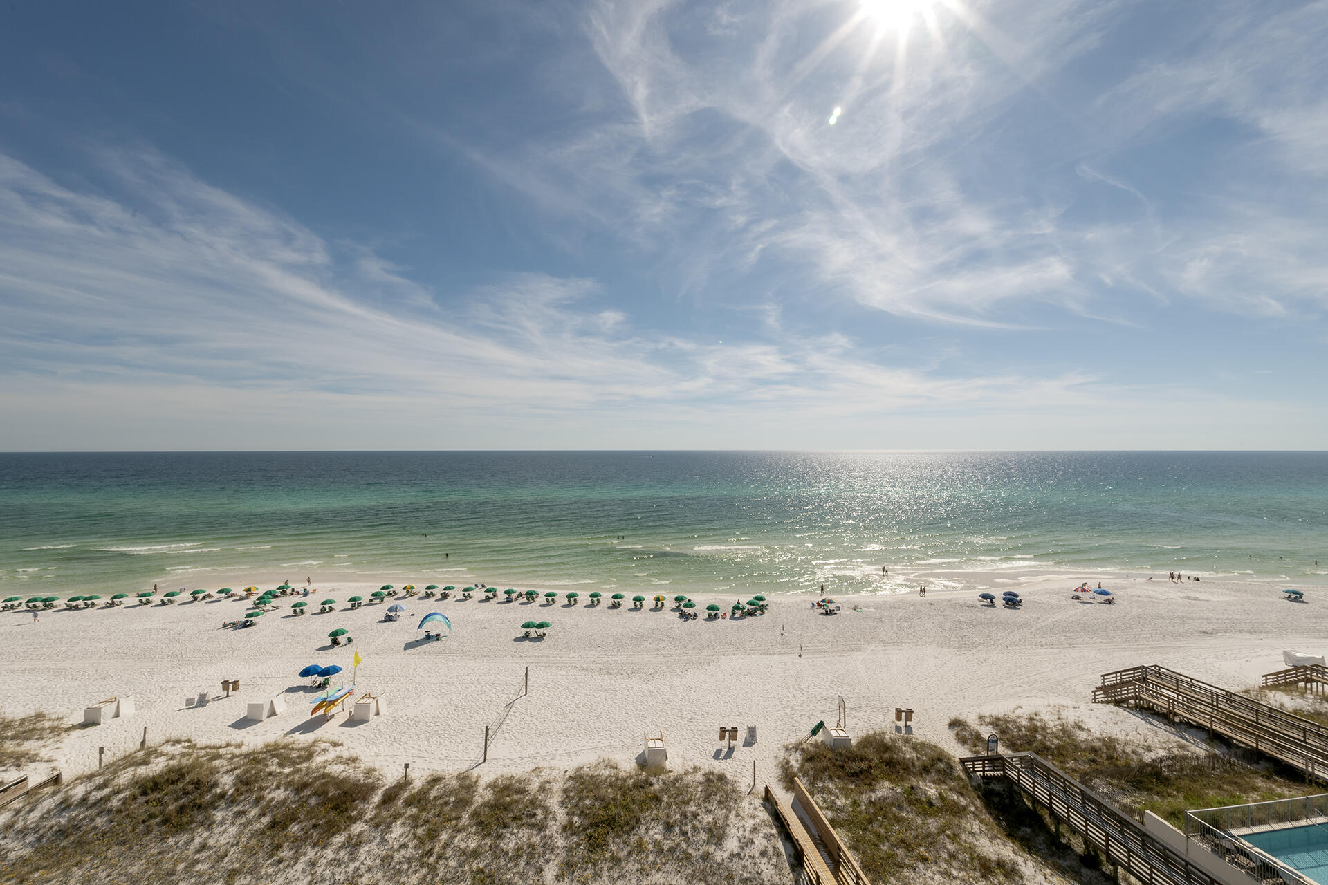 Gorgeous panoramic Gulf views from this 3BR/2BA, 1,315SF, front unit at Mainsail with warp around balcony. These units rarely come up and are highly sought after. This unit features a large wrap around balcony, giving coastline Gulf views and even a peak at the Bay. The kitchen features tile countertops, stainless appliances, beautiful views, & a breakfast bar.  The living space is large and open with plantation shutters throughout and amazing views of the Gulf & Beach.  This unit is being sold as-is and fully furnished. Other features include travertine floors, wet bar, & amazing views from every room. Rental Projection of over $75,000.00. Don't miss this great opportunity to purchase this unique unit with beautiful views of emerald waters and white sand beaches. See you at the beach!