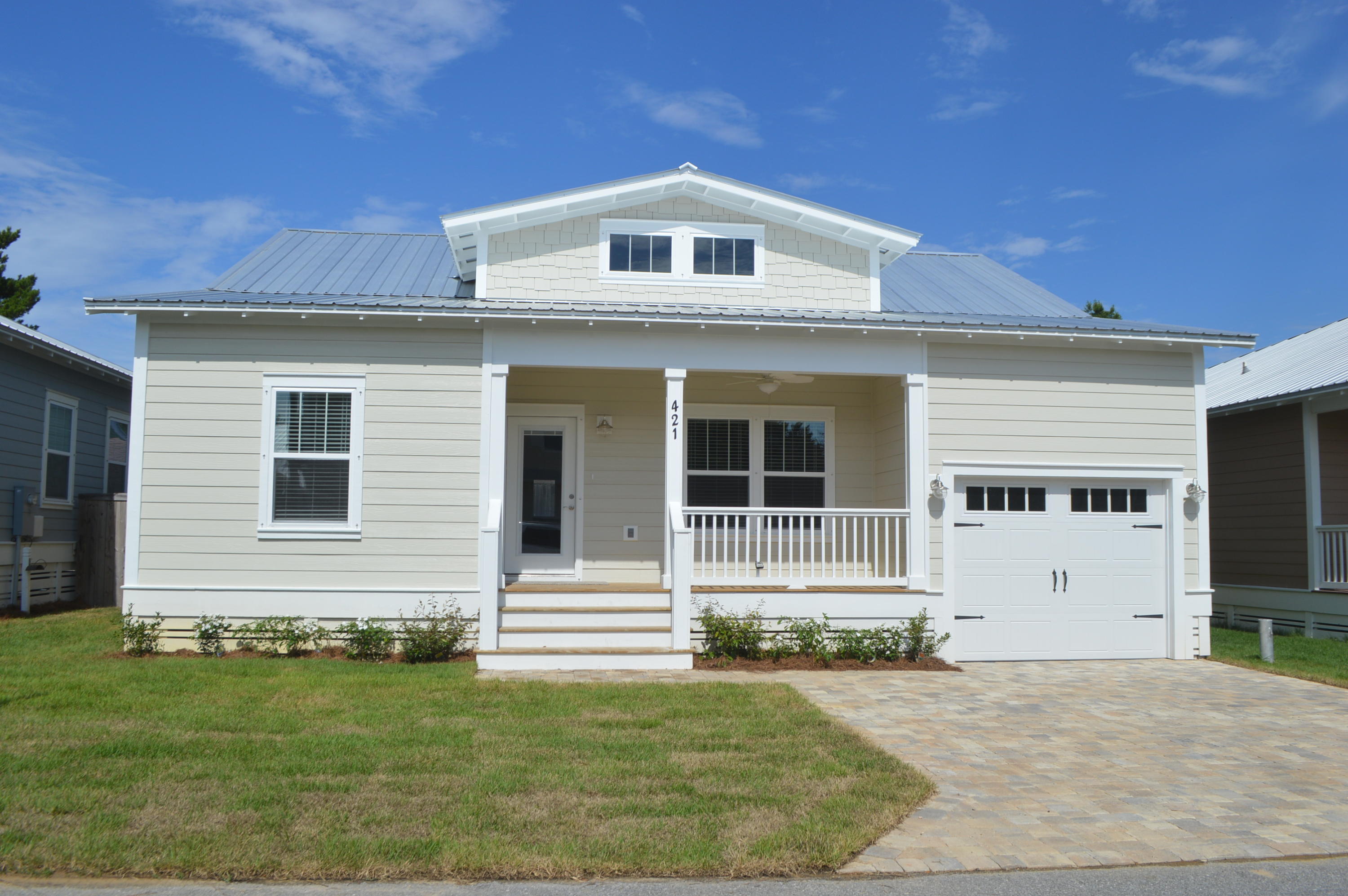 NEW CONSTRUCION WEST END PCB! Paradise Grove is one of PCB's hottest new subdivisions. Close to Pier Park and a short drive to 30A. This gated subdivision features a resort style pool, lush landscaping and community park areas. This home is a 3 bedroom/ 2 bath with a multi-functional bonus room. Can be a bedroom, bunkroom, office or dining room. Many upgrades such as the ''coastal'' trim package, brushed nickel hardware, hardi-like exterior, wood look tile in the main areas, granite countertops, stainless appliances and more. The Master Bedroom has a large walk in closet. The Master bath has double vanities, soaking tub and separate shower with a glass door.