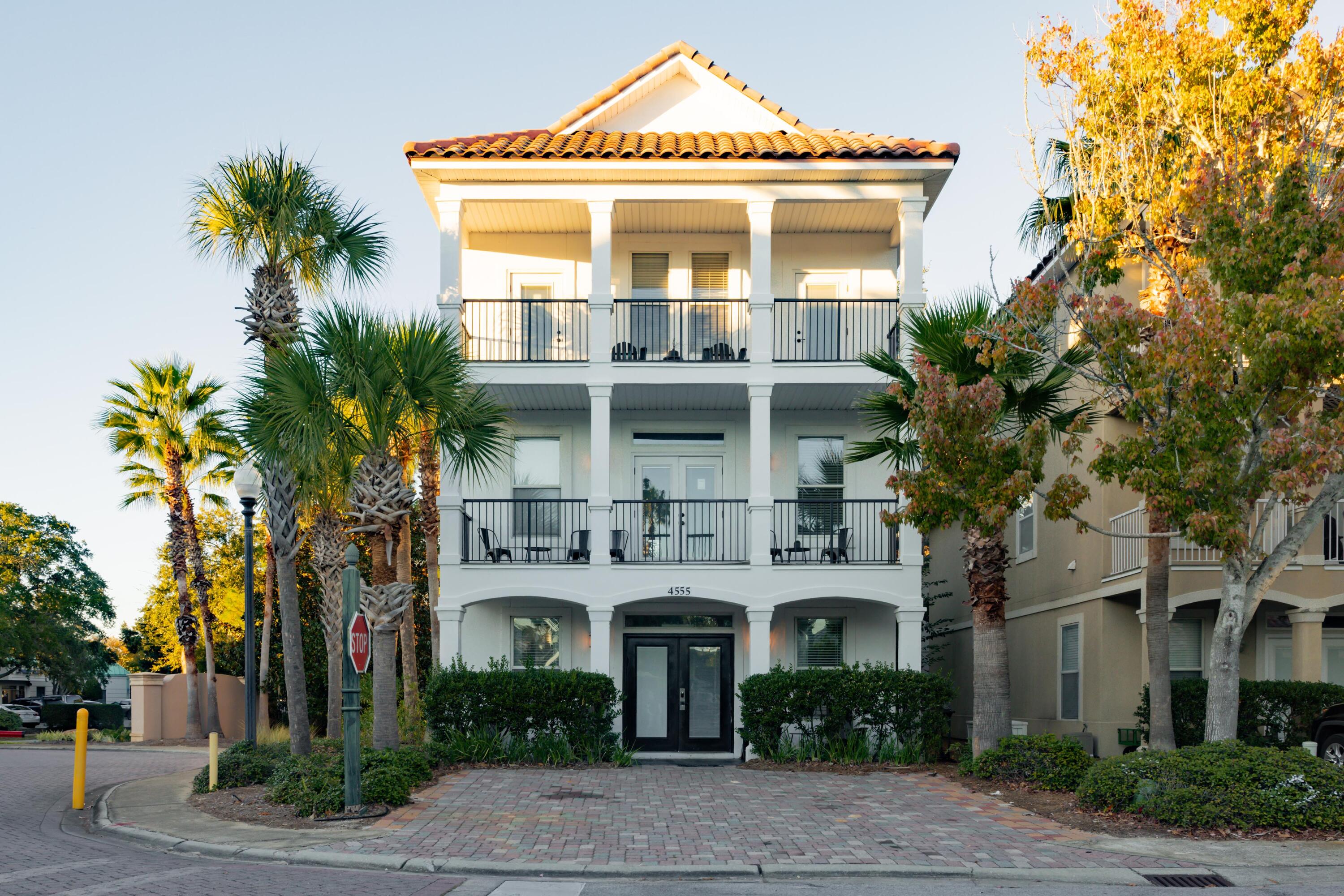 Newly repriced $200,000 below its former asking -- 4555 Village Way is a six-bedroom coastal retreat in Villages of Crystal Beach built for effortless group living and exceptional rental returns. A main-level primary suite, five bedrooms up, two living areas, and wide porches overlook a lagoon-style pool with zero-entry, waterfalls, hot tub, and gated access. Refined interiors feature hard-surface floors, updated cabinetry, refreshed baths, and dual HVAC. The social main floor flows seamlessly to a deep covered porch. Moments from the Gulf, Henderson Beach, Destin Commons, and premier dining. Delivered turnkey in a proven rental corridor.
