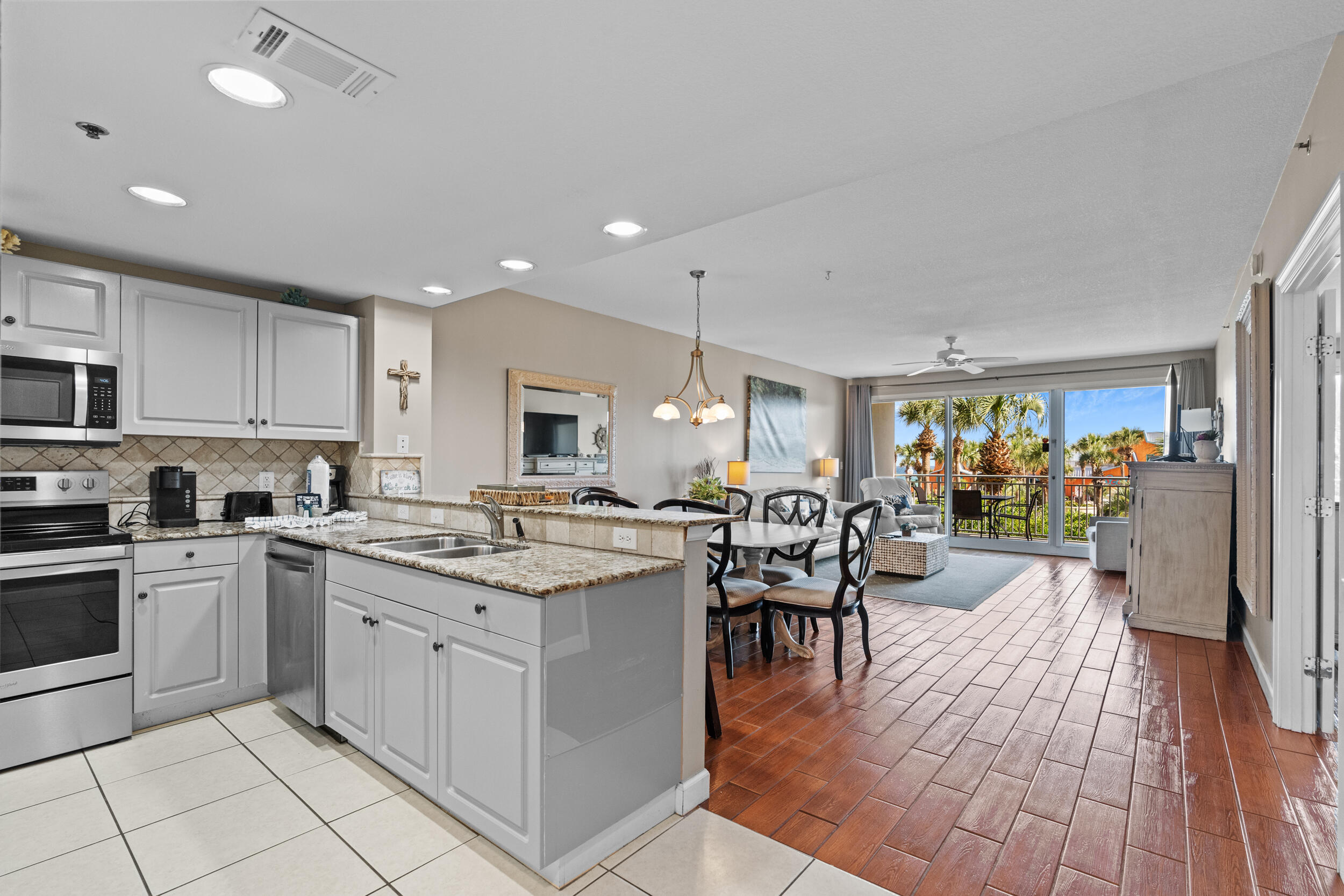 **PRICED TO SELL***THE BIGGER 2 bed/2 ba floor plan with Private OVERSIZED BALCONY and peekaboo view of the Gulf.  Projected Income $40-$50K . Being located on the second floor and close to stairway makes it very convenient. NO NEED TO WAIT FOR THE ELEVATOR ... just walk right down to your car, beach and pool. Cannot be better! The condo is very well decorated with the beach in mind. You actually have a peekaboo view of the water from your very private balcony. Some of the highlights: NEW water heater, no carpet, no popcorn ceiling, full size washer/dryer, stainless steel appliances and granite countertop in kitchen, separate shower with jacuzzi tub in the primary bathroom, fully furnished - turnkey ready. Sterling Shores is a gated complex in the heart of Destin featuring 400' of private beach, a lagoon-style pool with mushroom spray fountain, sundecks, & a beachside pool with Tiki bar & grill. Other amenities at Sterling Shores include a fitness center and The Back Porch restaurant, one of Destin's most popular beachfront restaurants, is just steps away. Hurry to schedule a viewing. The price is right!