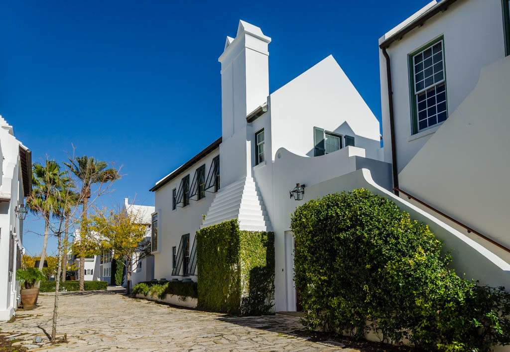This 4 bedroom, 4.5 bath courtyard home, designed by architect Eric Watson, features outdoor areas that serve as the organizing elements connecting an inviting courtyard, detached master suite, junior master suite, living and dining rooms, and kitchen. The expansive courtyard features a generous dipping pool and covered terrace that shades ten sets of French doors leading to the house. Inside the home, you'll find a spacious living room, well-appointed dining room and a gourmet kitchen with Bosch, Wolf and Subzero appliances.
The master suite, located across the courtyard from the main house, has 25-foot vaulted cypress ceilings, a large bathroom with a jetted tub and a sunken shower, and a private seating area just outside next to the pool. Two guest bedrooms and two baths outfitted wi Two guest bedrooms and two baths outfitted with marble and tumbled stone are located on the second floor and enjoy a sunny study overlooking Sea Garden Walk.