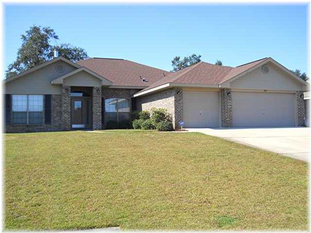 If you are looking for Quiet, Wholesome Living; A place to raise a family, a Home with Generous Living Space, then this attractive, well maintained, all brick, 4 Bedroom/3 Full Bath home with unique desirable Split Floor plan is just what you have been looking for. Speaking of openness, and an Airy feel, this home has it all. 10 ft ceilings in entry, Formal Dining area, Office/Study, and Family Great Room. Has Dazzling Stainless Steel fully appliance Kitchen w/ample counter and cabinet space any Chef would love. The Kitchen Breakfast Bar ties the Kitchen, Breakfast Nook area, and huge Family Great Room w/cozy fireplace together making it a perfect setting for the Hostess who enjoy entertaining family and friends. Master Suite offers tranquil oasis with a two-at-a-time privacy bathroom design. Yes, this home also has closet and storage space galore, but that's not all. Laundry room w/Washer & Dryer, leads into 3 Car Garage w/Garage Door Opener. Has covered Lanai plus a lawn pump & Sprinkler System. Has Security System too for peace of mind! Let the pictures tell the story, then come see for your self. Worth seeing, Worth renting. Sorry no Smoking.