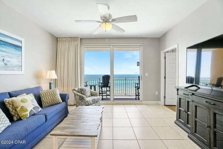 Best of the best in Splash! This premier, updated, and & upgraded Gulf front condo has a seasoned rental history and is completely turnkey. Enjoy beach living at its finest! Splash's incredible location and outstanding on-site amenities creates a special resort that is unique in Panama City Beach. This is an amazing price for a beautifully furnished, direct beachfront condo - this 2 Bed, 2 Bath (Wave) floor plan has riveting Gulf views from the living/dining area, kitchen, generous balcony, and gulf front master bedroom. The professionally decorated and beachy-chic themed unit features 9' ceilings, a spacious master suite, generous guest bedroom, a large balcony, and interior upgrades such as slab granite counters in the kitchen and bathrooms, hard surface flooring throughout, and stainless-steel appliances. The property is meticulously maintained and truly turnkey. Perfect elevation within the stack: not too high and not too low! Splash! Offers all the Amenities of a true destination resort...over 400 feet of pristine Gulf frontage, two distinct waterpark environments - Complete with Lazy River, Toddler Frog and Turtle Splash Pad, and kids Water Bucket Playground, full state-of-the-art Fitness Center, a Pool and Jacuzzi just for the Adults, Island Style Beach Bar and Grill, Covered Parking, Interactive water Toys, and coffee & snack shop. All this PLUS Covered Garage Parking, a Beach Apparel/Surf Shop and On-Site Rental Management & Check-In desk. It's all here at SPLASH! Located in the Heart of the Best Restaurants, Shops and Entertainment of course, Pier Park!