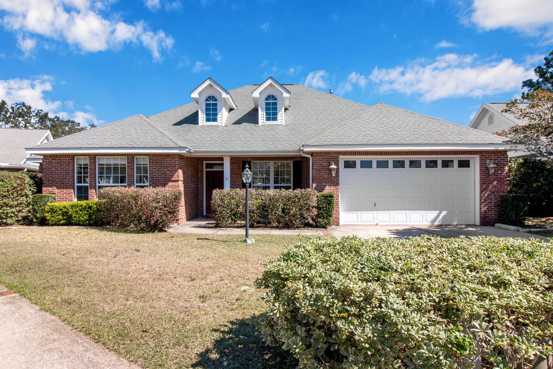 Highly desirable community of Magnolia Plantation is home to this beautiful open floor plan 3 bedroom 2 bath home. This floorpan was a Parade of Homes Winner and one look will tell you why! Some it its attributes are a grand living room with frayed ceiling complimented by a gas fireplace and separate formal dining room with wood paneling accents. The light and bright kitchen is the dream of any chef with an abundance of counter/cabinet space, stainless appliances, extra island workspace and tiled floors. The finished Florida Room is an Incredible Bonus Room for added living space off of the kitchen and makes a great den, play room, or office. The large Master Suite is beautifully designed to include trayed ceiling. The master bath includes double vanity,  jetted tub and oversized separate shower. 2 additional bedrooms are spacious and enhanced by lots of natural light. You'll appreciate the indoor laundry room and large 2 car garage. Fully fenced backyard is perfect for pet. Owner will consider SMALL pet with a non refundable pet fee. Restrictions apply. Any pet must be spayed/neutered, current on all shots and housebroken. Any person 18 years old or older must complete separate applications. Tenants required to carry renter's liability insurance.
