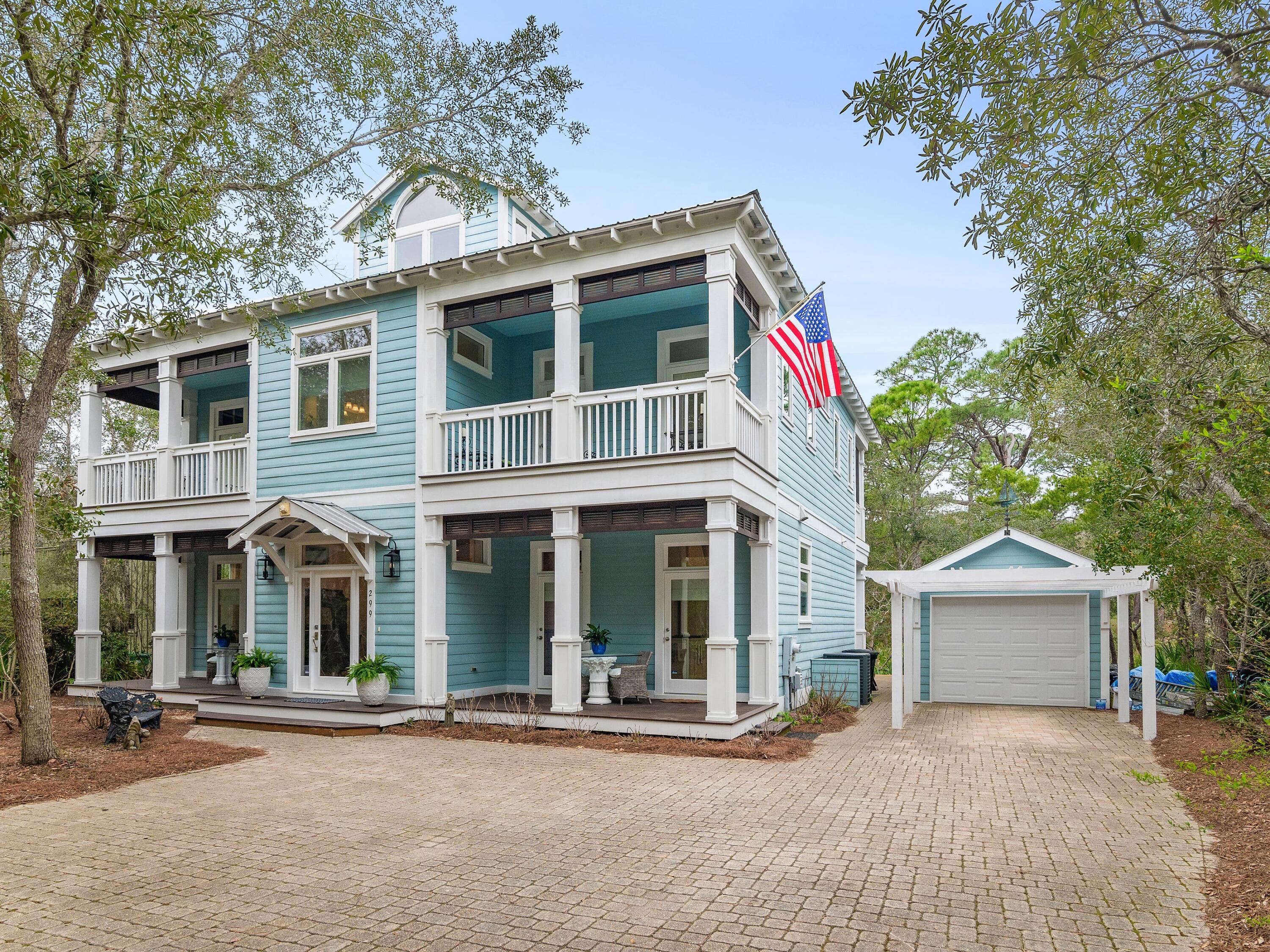 This waterfront residence is nestled gracefully on the shores of Western Lake in Grayton Beach. Prepare to be enchanted by the breathtaking views that greet you from every corner of this impeccable abode. Your own private dock, complete with a Carolina Skiff boat, 15 hp Yamaha motor, trailer, boat lift and paddle boards beckons you to embark on leisurely cruises across the tranquil dune lake.  Enjoy the freedom to explore the coastal waters at your leisure, whether by boat, kayak, or YOLO board, with direct access to the beach via the lake right from your backyard. For the angling enthusiast, fishing opportunities abound - cast your line from the dock or venture out on your boat for a day of reeling in the catch of the day. Nestled within a gated, rental-restricted community, this oasis south of 30A offers a peaceful escape from the hustle and bustle of everyday life. Indulge in the exclusive amenities, including a sparkling pool, recreational area, and a communal dock perfect for aquatic adventures. Inside, discover a harmonious blend of elegance and comfort, with custom-designed features meticulously crafted by the renowned Dallas design firm of Flick-Mars. From the cedar siding to the bamboo flooring and the inviting screened porches, every detail exudes sophistication and meticulous care. Every window throughout the home has been upgraded to hurricane windows, as well as new carpet in the guest bedrooms. There are porches off of every bedroom and a wonderfully spacious master and walk in closet with a center island for additional storage as well as a newly remodeled en suite.  Ascend to the huge Crow's Nest flex space on the third floor, with new carpet, vaulted, white-washed ceilings frame mesmerizing views.  You can choose how to use this space, as a separate living area, kids game room, or an additional bunk or bedroom. Also, there is room for a carriage house above the garage if additional square footage is needed. Parking is never an issue with this large lot allowing parking for 6 vehicles. Surrounded by the natural beauty of state park land, this retreat offers the utmost in privacy and serenity. Yet, just beyond its gates, awaits the vibrant charm of Grayton Beach, with its eclectic array of shops and restaurants. Embrace a lifestyle of unparalleled luxury, where every moment is a celebration of coastal living at its finest.