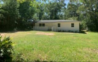 Country living but close to shopping and schools.
House has been renovated. New vinyl plank flooring, paint, hot water heater, heat and air , windows and bathroom cabinet.
note: half bath in laundry room off carport.
Please call office and ask for Celeste for showing instructions.