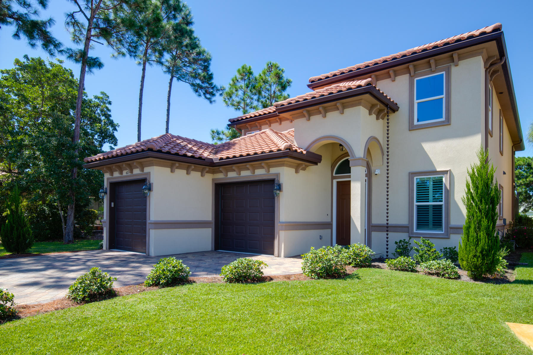 Immaculate 4 bedroom / 3.5 bathroom custom built home by Gargus Construction in the prominent golf community of Emerald Bay. This home boasts 2 separate living areas, one upstairs and one downstairs. There is also an office/library and a master suite on the main level. On the second level you will find 1 bedroom with an ensuite bathroom and the other 2 bedrooms are separated by a full bath. The gourmet kitchen is one any cook would love and the enclosed pool and lanai is perfect for entertaining guests. Over $22K in upgrades and improvements (list in documents). Be sure to click on photos and then click on virtual tour!
