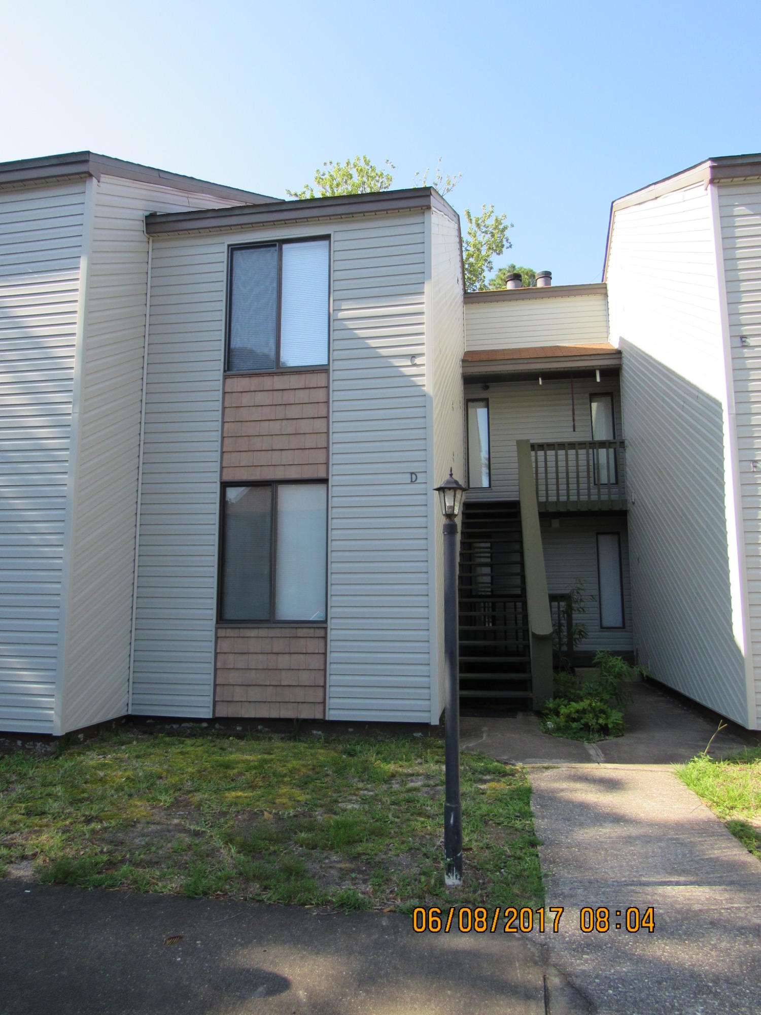 You will love this location! Cute downstairs unit close to shopping, beaches and schools. Two good sized bedrooms, kitchen, dining room and lovely living room with fireplace. Nice fenced yard for your privacy. Sorry, No PETS are allowed at this complex and no smoking inside unit.