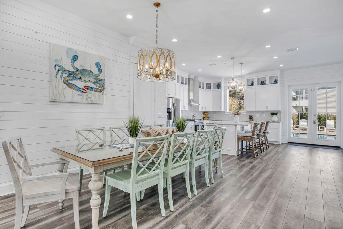 Pristine new construction prominently situated in Destin's Crystal Beach corridor yielding exceptional short term rental potential with over $120,000 in gross revenue already booked for 2021 and a target of $200,000 in total projected annual income. Masterfully designed and beautifully furnished, this impressive 8 bedroom, 7.5 bath retreat yields resort style amenities including a private elevator and exemplary private resort style pool. Notable features include an open floor plan with first floor primary living including a large chef's kitchen finely outfitted with stainless appliances as well as ample custom cabinetry adjacent to a large living & dining area that effortlessly flows to the outdoor resort amenities. Other notable features include a living space on each level, covered porches, hardiplank siding, fire suppression system, hurricane rated impact windows & doors, ample parking with an oversized brick paver driveway as well as outstanding positioning near excellent beach access as well as walking distance to world class dining. Crystal Beach embodies a nostalgic old Florida charm with a prominent location in the heart of Destin near world class beaches, golf courses, local entertainment, shopping & dining including the Destin Commons, Whole Foods and Legendary Marina.