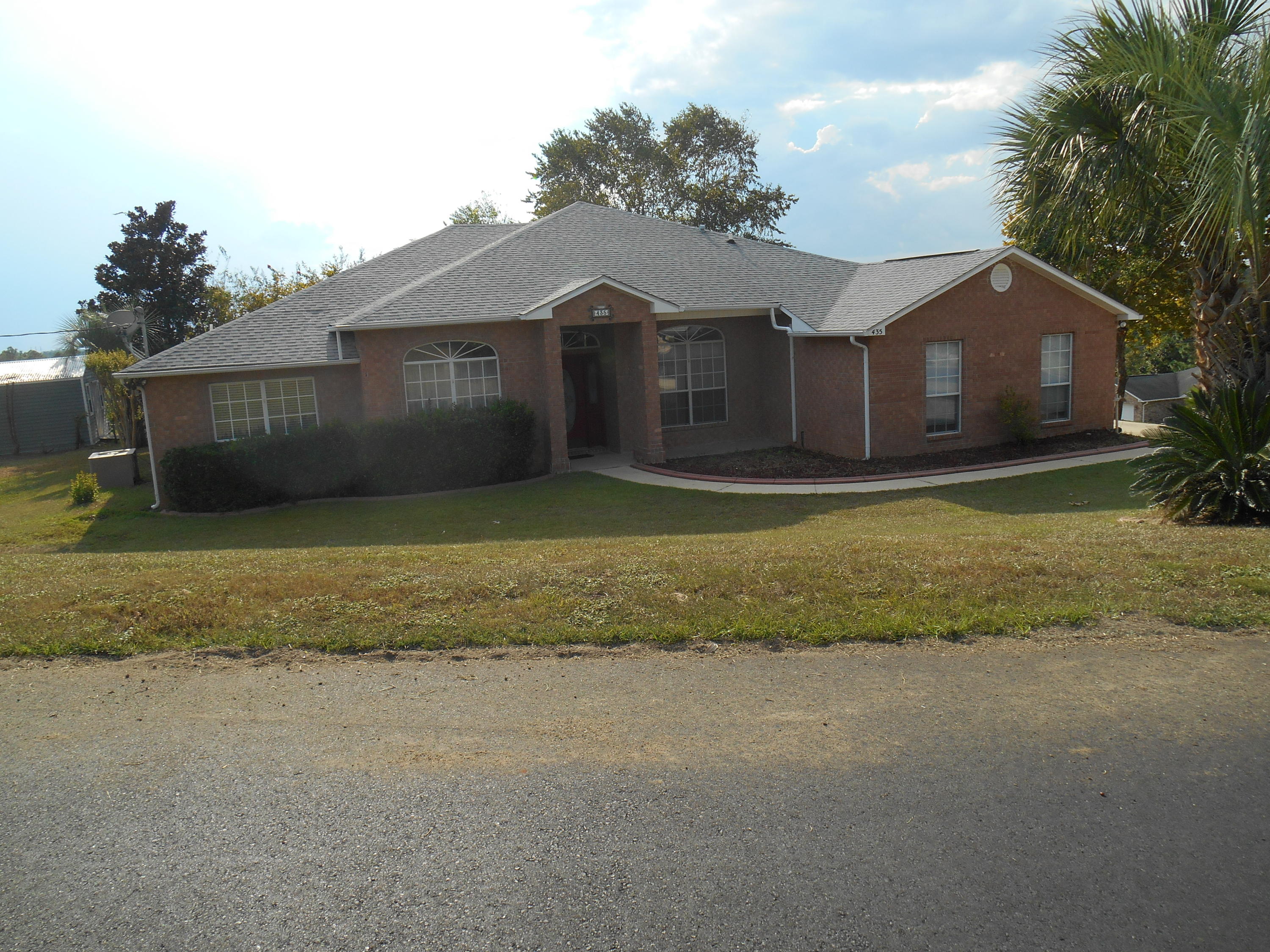 Remarks: AVAILABLE Now. Very nice 4 bedroom, 2 Bath house SOUTH of I10; easy commute to Eglin, Duke Fld, 7th SF and Ft Walton Beach. This all brick home sits on a large corner lot. The U-shaped driveway is accessible from 2 sides allowing easy entry into the attached 2 car garage or the 2 car covered carport - great for storing the boat, camper... The impressive master suite is very large and has French doors that access the air conditioned Florida room. The kitchen has a center island, plenty of cabinets and a breakfast nook. Living room has cathedral ceilings, there is a separate den/office and formal Dining Room. Elegant ceramic tile, new carpet in all bedrooms, chair rails, crown molding, comprehensive security system, state of the art art surround sound, automatic sprinkler system (AS IS) and a 12 X 16 outbuilding/workshop with electricity are some of the numerous features that make this distinctive home one that should not be missed! Pets Welcome with owners approval.  Call for Appointment, will show on weekends.