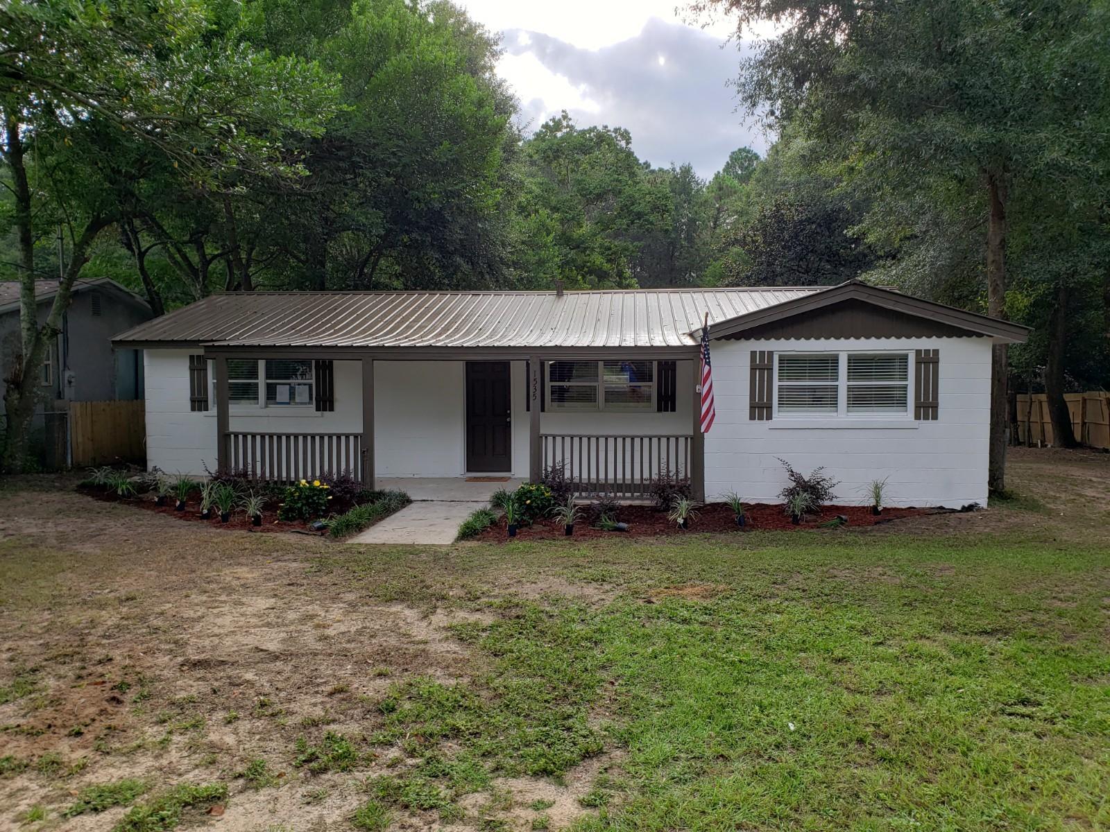 Completely remodeled* New AC,updated kitchen with Granite, Updated bath,New paint,lights and fans, Metal Roof Good Condition**