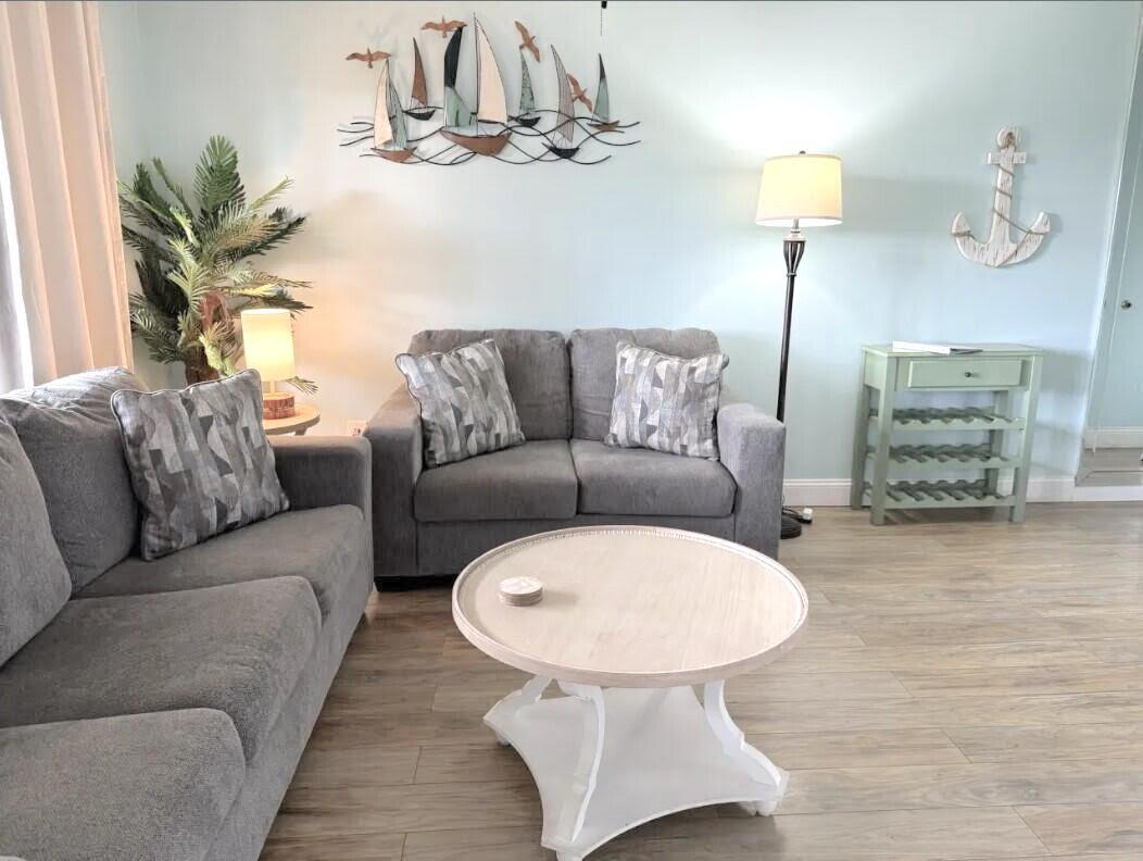 Extremely motivated seller! $2000.00 Buyer credit with acceptable offer! Price reduction! Don't miss out! Seller is entertaining all offers!! Bring an offer!  Also new charging stations and on site security staff. This Updated & Charming Gulf Terrace Condo is The Ultimate Beach Getaway! Welcome to your perfect beach retreat! This charming and pet-friendly condo, nestled within the gated Gulf Terrace community, comfortably accommodates up to six guests and offers an unbeatable blend of comfort, convenience, and coastal charm. Gulf Terrace has recently introduced exciting updates, including a refreshed clubhouse, a game room, and eye-catching entrance signage. Residents enjoy a wealth of amenities, such as three sparkling pools (one heated seasonally),  tennis courts, BBQ grills, boat/ trailer parking, and the tranquil Turtle Lake. Step inside to find a bright and inviting living space featuring a spacious sectional ideal for unwinding after a day of exploring Destin. The dining area seats four, perfect for meals or game nights, while stylish and low-maintenance LVP flooring enhances the modern appeal throughout. The thoughtfully designed floor plan includes two well-appointed bedrooms and a full bathroom with dual entrances for added convenience.
The fully equipped kitchen boasts stainless steel appliances, ample cabinetry, and a breakfast bar whether you're preparing quick snacks or gourmet dinners, this space makes it effortless. Step out onto the private balcony to enjoy your morning coffee or relax in the evening while overlooking lush green space and the nearby pool.
Perfectly situated within a gated community near Big Kahuna's Water Park, premier shopping, dining, and just a short drive from the pristine beaches of Destin, this condo's location is second to none. Whether you're seeking a vacation rental, a long-term investment, or a primary residence, this property offers outstanding potential. Plus, its proximity to Harbor Walk Village, amusement parks, and world-class fishing ensures endless entertainment.

Don't miss this opportunity to own your own slice of paradise in Destin. Schedule your private tour today!
