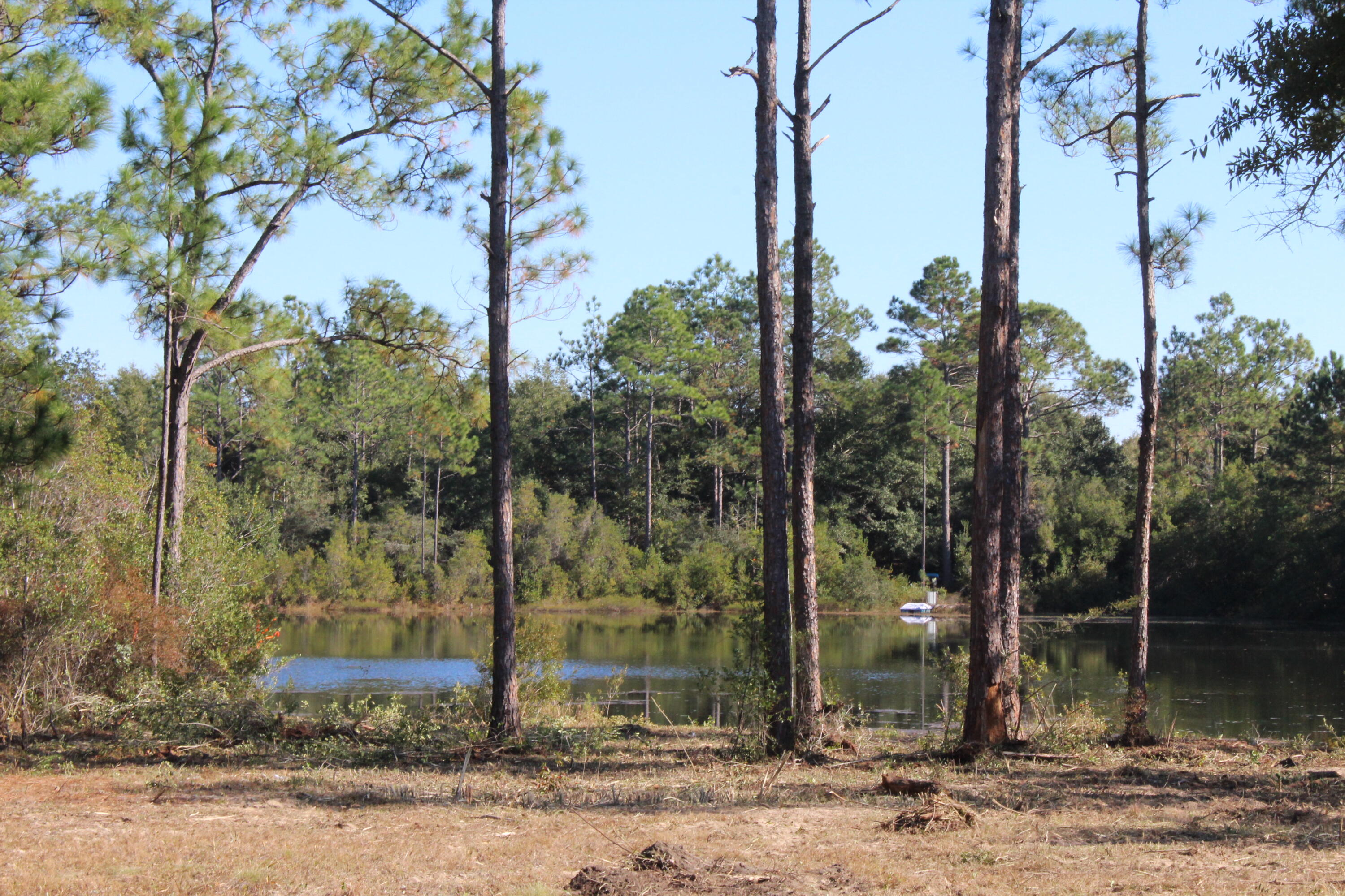 Rare Waterfront Homesite on 5+- Acre Pond. - Priced to Sell!
Seize the opportunity to own this hard-to-find waterfront homesite on a 5-acre lake! Perfectly priced to sell, this property is already cleared and ready for you to build your dream home or mobile home.
Key Features:
•	 Prime Waterfront: Enjoy serene lake views and private access.
•	Ready to Build: The site is cleared and prepared for construction.
•	Mobile Homes Welcome: Flexibility for various housing options.
•	Great Location: Just minutes from downtown and shopping, offering convenience without sacrificing tranquility.
Don't miss this incredible opportunity to create your perfect lakeside retreat! Schedule a viewing today!!!