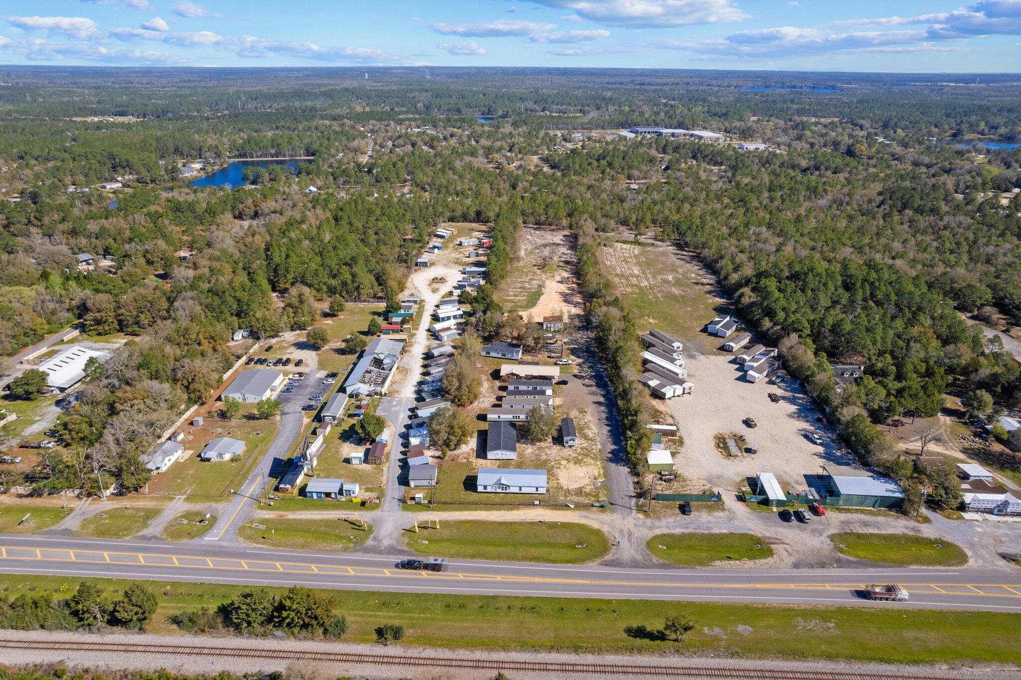 Listing consists of four parcels (19-3N-19-19390-001-0010, 	19-3N-19-19390-001-0013, 19-3N-19-19390-001-0014, 	19-3N-19-19390-001-0012) All right next to each other collectively making up 5.5 acres of land along US HWY 90 W, right the city of DeFuniak Springs.