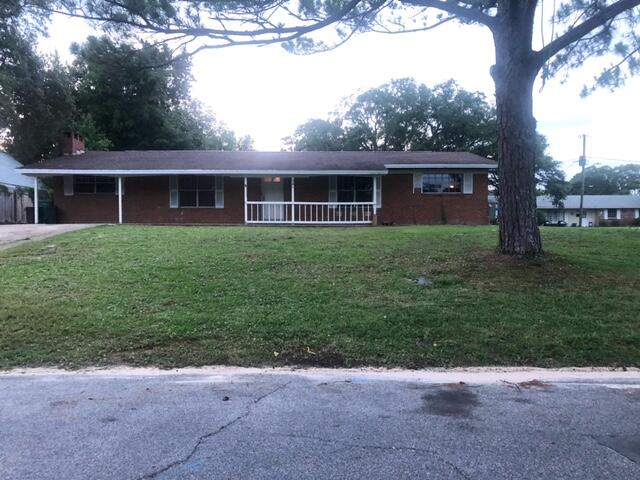 Wonderful home with LOTS of potential! You don't want to miss seeing this lovely 4 bedroom home on a LARGE corner lot! Conveniently located in Ft Walton Beach, just minutes from shopping, beaches and military bases. Features include: spacious kitchen w/ oak cabinetry, over-sized laundry room and den/office with fireplace. French doors, covered rear patio, storage building and fenced yard. 
Centrally located in a well established neighborhood, this home is ideal for a growing family. This home is a great fixer upper with some TLC. 
The property has a very nice lot fully landscaped with a sprinkler system and fenced yard. Contact your agent today to view this beautiful home. You won't be disappointed - it's a MUST SEE!