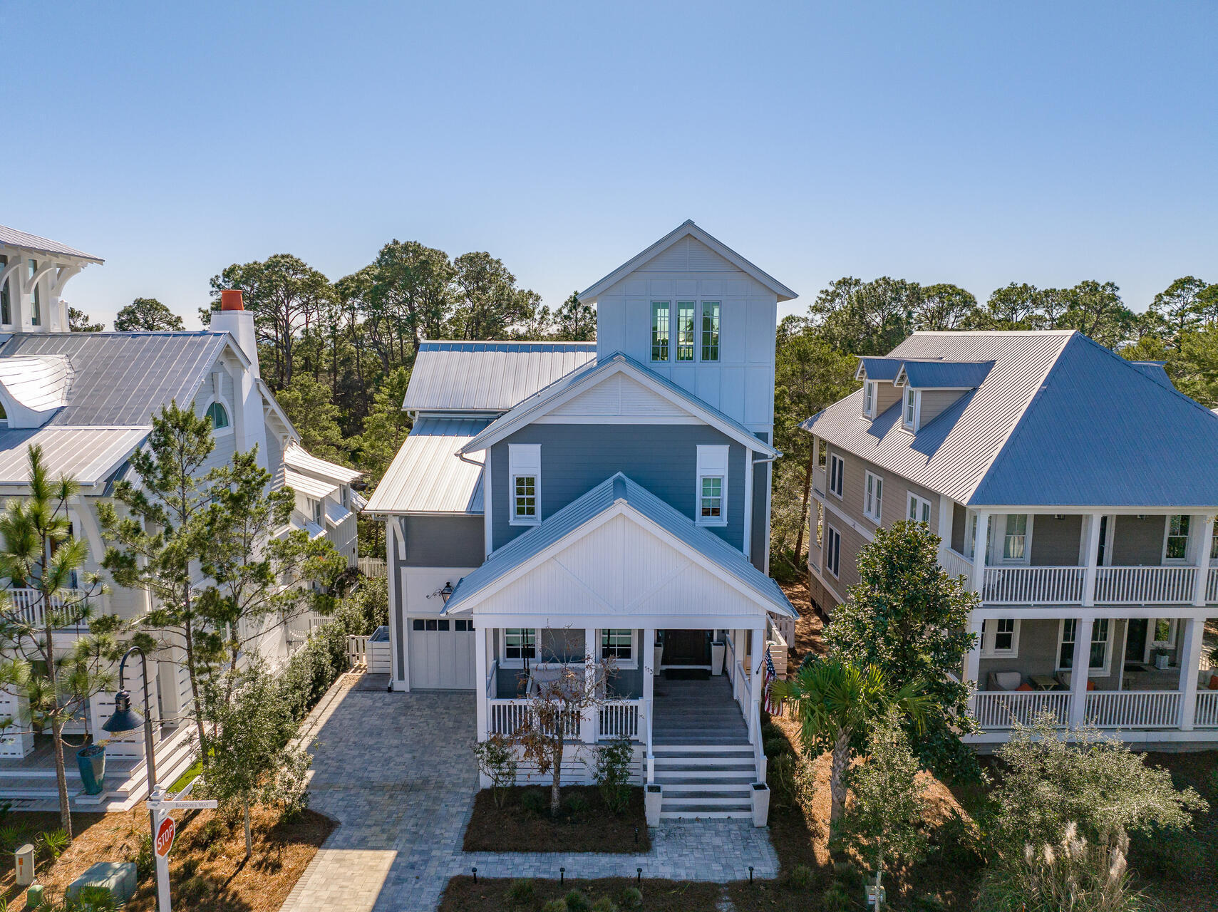 Designed By Margaretten Architectural and built by a highly regarded local builder for his family, this home makes the dream come true for anyone wanting to live within easy walking distance to the beautiful beaches of 30A via the neighborhood's deeded beach access.  Vaulted bedroom ceilings with beams and shiplap throughout the living area displays rustic quality.  Wide plank engineered hardwood floors throughout the home continues with the appeal of cozy solidarity.  30'' deep kitchen Marquis cabinets paired with quartz countertops plus the highest luxury appliances create the most wonderful place to cook for family and friends.  Appliances include a Sub-Zero refrigerator, 48'' Wolf gas range with downdraft range vent, Cove dishwasher, GE Ice-O-Matic nugget ice machine and Wolf microwave With 3 walls of windows streaming in natural light, the eating area in the kitchen beckons everyone to sit and enjoy their morning and evening meals together.  Take your cup of coffee, book or glass of wine up to the 3rd floor tower to absorb the beauty of the  dazzling turquoise gulf water.  Gorgeous designer lighting throughout including chandeliers that hang in the eating area, study nook, the master bathroom and from the open area upstairs.  A walk-in basement/outdoor living area offers 700 sq ft of space perfect for having a party, watching sports and playing games.  The bunk/movie room provides ample space for extra family and friends to stay.  Built-in speakers in the basement, tower, living room, and movie/bunk room add enhanced listening and atmosphere for entertaining.  The custom bed swing hanging from the pecky cypress ceiling of the front porch made of Cumaru decking, presents another opportunity to lounge and take an afternoon nap.  The Preserve at Grayton Beach amenities include 2 pools, tennis courts, pickle balls courts and private deeded beach access with Boardwalk.  Located between Grayton Beach and Blue Mountain, you and your guests can bike and walk to ice creameries, popular restaurants, fun boutiques all along 30A and attend nearby concerts.  Please see documents for short term rental projections. 

Additional features of this home include:  
a GenerLink Transfer Switch installed at the meter that will accept a back-up generator, 
Navien tankless water heater, 
Culligan water softening system and reverse osmosis drinking system, 
all doors and windows are Windsor aluminum-clad, hurricane rated, impact resistant with multi-point locks,
front door is a Signature Doors Inc. mahogany door, hurricane rated and impact resistant,
all interior doors are solid core 1-3/4",
Trane 14 SEER heat pumps for the 1st and 2nd floors with electric heat strips,
separate whole house dehumidifier with fresh air intake, integrated with the AC system, 
Mitsubishi mini-split AC system in the tower,
Iron-a-Way built-in ironing board system.