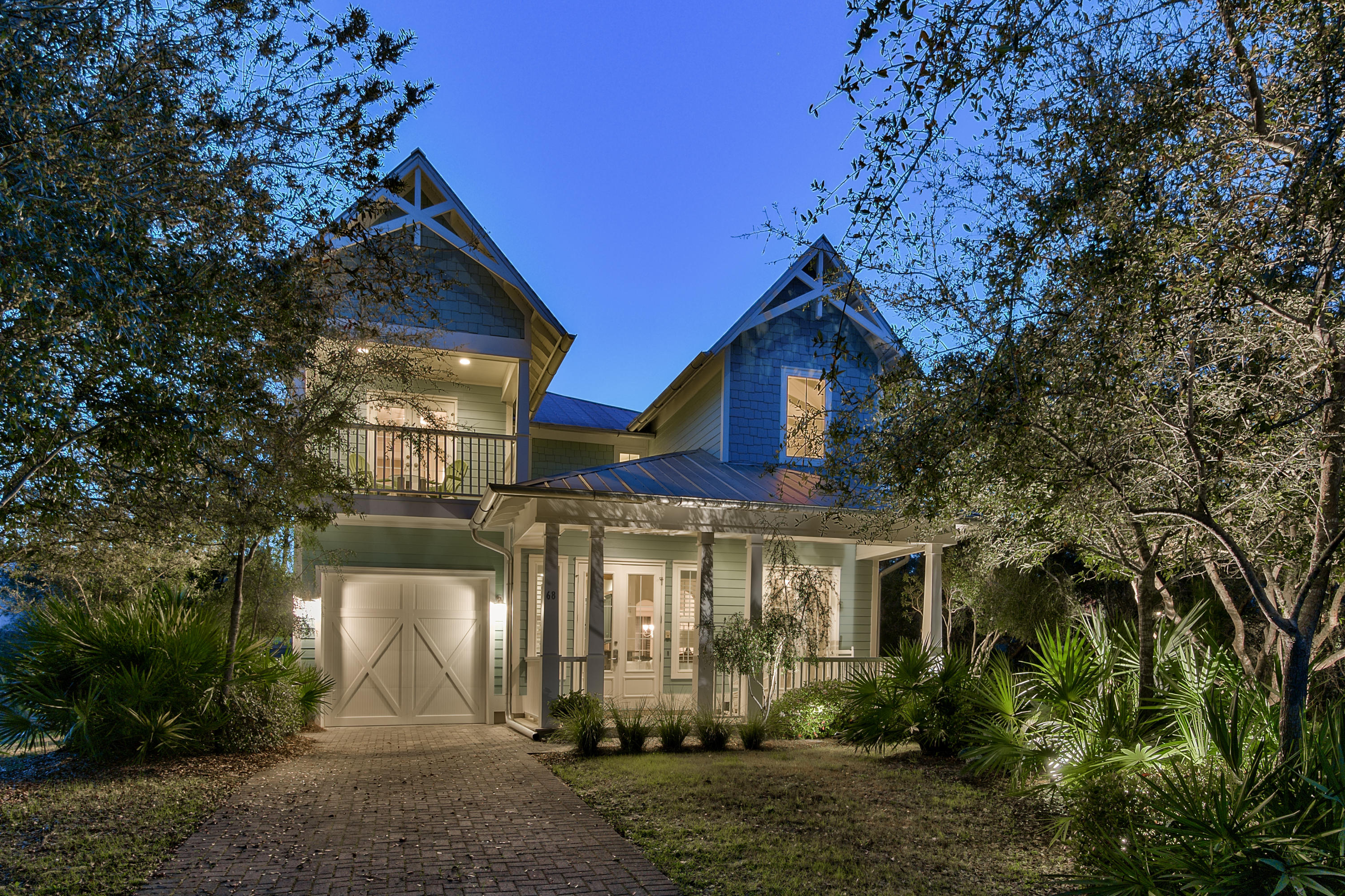 JUST IN TIME FOR SUMMER, CLASSIC SEAGROVE BEACH GETAWAY // This warm and inviting 4 bedroom, 3 -1/2 bath home is located in the peaceful community of Eastern Lake in Seagrove Beach East. Meticulously maintained, with new paint throughout entire interior, and offering views of Eastern Lake, this getaway is the perfect environment for large family gatherings as well as intimate living. Just 150 yards to white sandy beaches, as well as conveniently located near the popular 30A bike path, here you will find a light filled open floor plan that includes rich hardwood flooring, high beadboard ceilings in the living area and chef's kitchen that boasts stainless steel appliances and counter seating for informal meals or conversation. There is ample space for guests with two master bedrooms with ensuite baths on both first and second floors as well as two additional spacious guestrooms, one that can be used as a media or family room. Step outside to the private backyard, adorned with mature landscaping and enjoy the screened in swimming pool and outdoor kitchen area with plenty of room to entertain. Whether looking for an investment opportunity, vacation property or year round home, this is the ideal house for any stage of life!