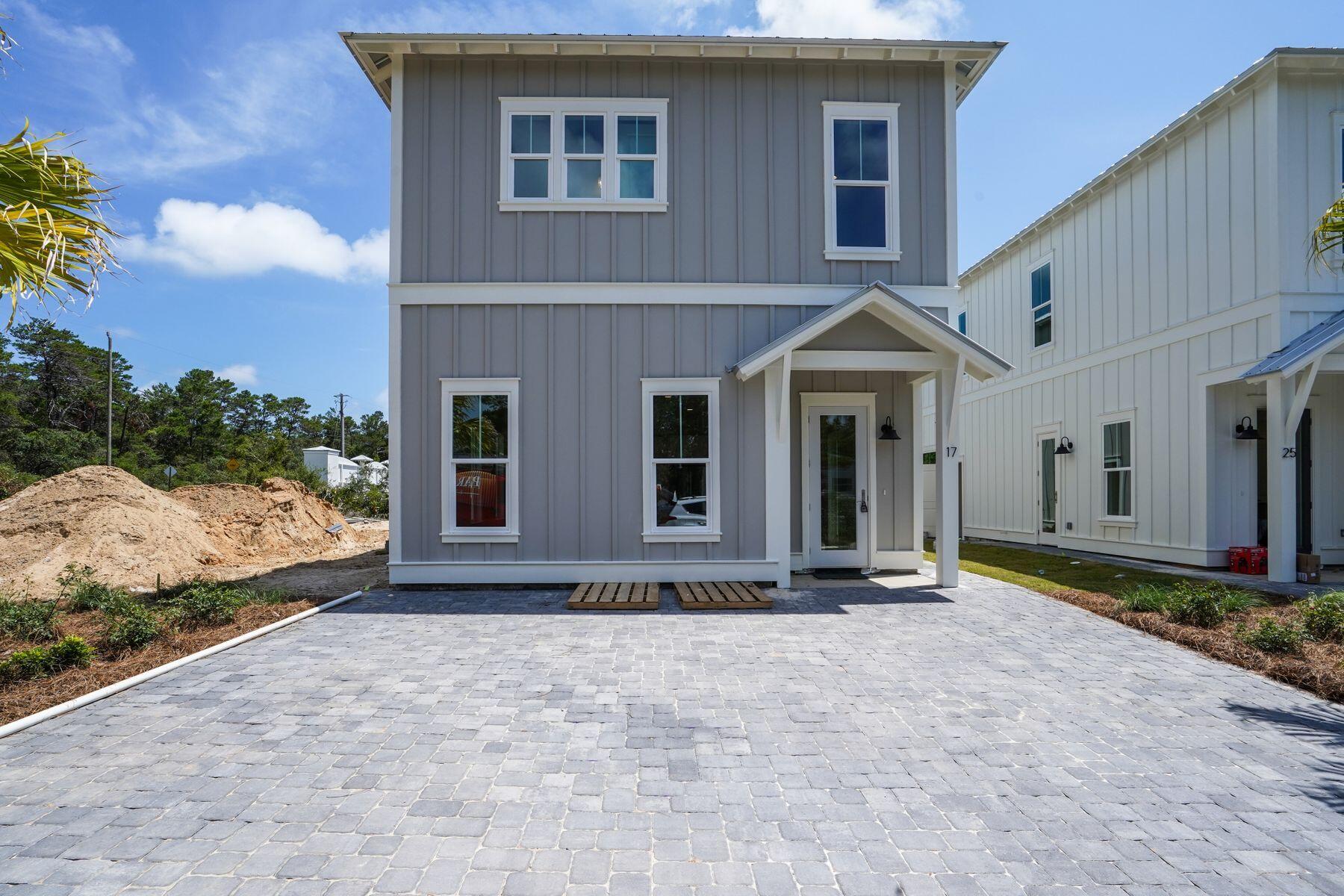 New construction home in sought-after Inlet Beach! Ideally located just a half-mile from easy beach access at the end of South Orange Street, this craftsman style residence is perfect as a rental investment, second home, or primary residence at the beach. Easy access to nearby Rosemary Beach, Seacrest Beach, and 30Avenue offers an endless array of shopping and dining options while still affording privacy from the hustle and bustle of the main 30A strip. Interior features include hardwood floors throughout, crown molding, a master suite with luxurious ensuite bath on the ground floor, and more. Photos and dimensions in this listing are of a similar home in the development to show style and finishes, and are not necessarily of the subject property.