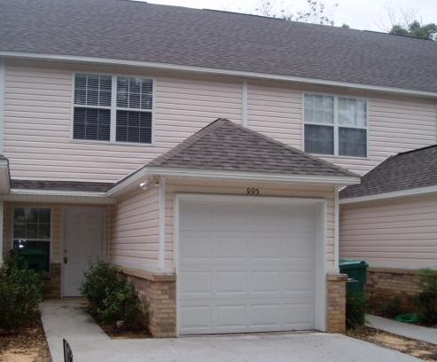Two-story townhome conveniently located off Hurlburt Field Road. Each bedroom has its own private, full bath. Tile floors in Kitchen, baths, foyer, & laundry. Carpeted stairs and bedrooms. Built-in microwave. All kitchen appliances included. Inside laundry and one car garage. Don't miss out! Sorry, pets are not negotiable. Available, May 10th!