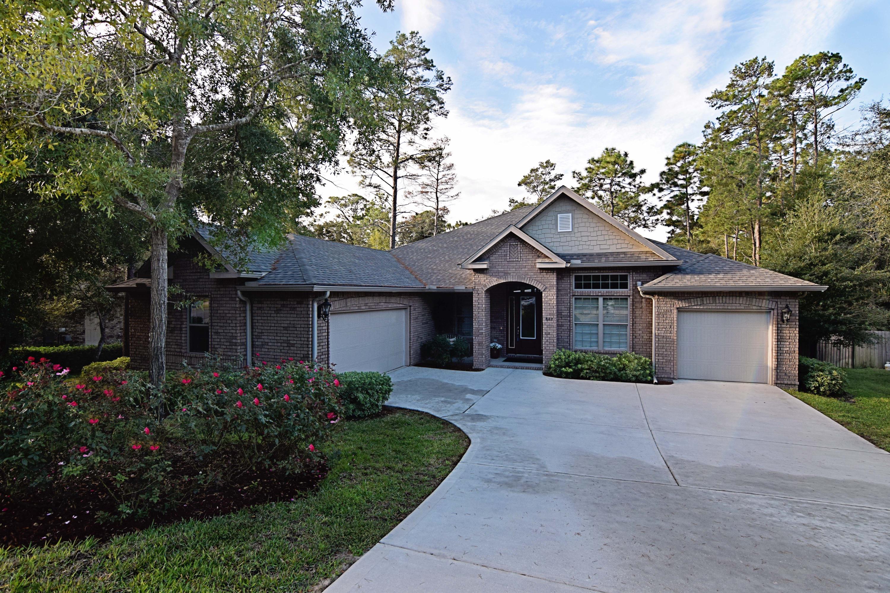 Congratulations! This is the home you have been looking for- it has everything!
This amazing home is open and airy with wonderful natural light, making the large spaces perfect for entertaining. The gourmet kitchen with its gleaming stainless steel appliances and beautiful granite features a walk in pantry and a large cooktop which is also plumbed for gas. Your family and guests can eat at the large breakfast bar, in the kitchen nook, or under the glamorous chandeliers in the formal dining room. The cook is part of the action with the kitchen completely open to the family room and near the laundry room. Can anyone join me in getting excited about a laundry room? This has got to be one of the largest and nicest in town, complete with a center island,tons of storage and counter space all wi granite! It would also be perfect as a craft or art room for you or the kids. All four bedrooms are large, but the master steals the show both in size and with the extra sitting area which could double as a nursery, office, gym or reading area. The master bath is like a spa with the deep soaker tub and large walk in shower trimmed with beautiful glass tile. Gentlemen, not only do you get the 3 car garage that you want, but one of the stalls is separate for you to store that special car or to finally have room for your workshop and projects. All of this is found on a hall acre lot with a park like view of the private green belt behind the fenced in yard. With room for a  pool and for the kids to play, this is an amazing property. There are so many stunning upgrades in this house that we don't have space to list them all, but picture high ceilings, crown moulding, tall doors and windows, hardwood floors and a huge beautiful covered lanai with ceiling fans. Please ask to see this home today- you will not be disappointed!