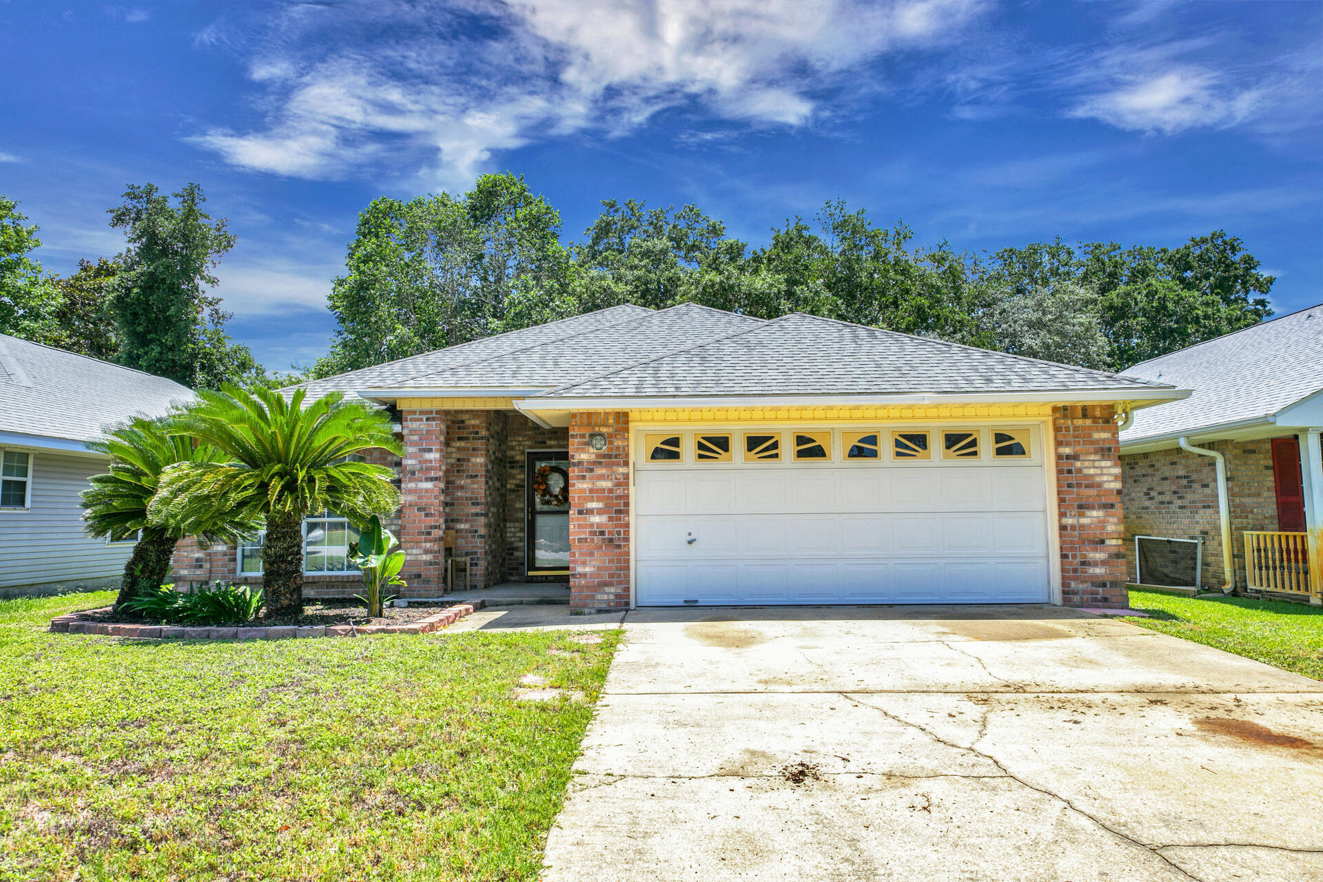 Beautiful Brick home with 3 bedrooms and 2 baths and 1442 sq ft.  The Ivalea Gardens Subdivision is a great neighborhood located on the south side of Hwy 98. Public access to the Santa Rosa sound is nearby! Enter the home through the storm door and notice the raised ceilings and notice the updates! The kitchen features and island with shiplap, white cabinetry, and stainless and black appliances. The home also features updated door millwork to include headers over the doors! This home features an open floor plan where the kitchen and dining room open to the living room. There is also a split bedroom floor plan. There is a nice covered porch on the rear of the home and mature shade trees to make enjoying the outdoors even more enjoyable. Buyer to Verify All Dimensions and Information.