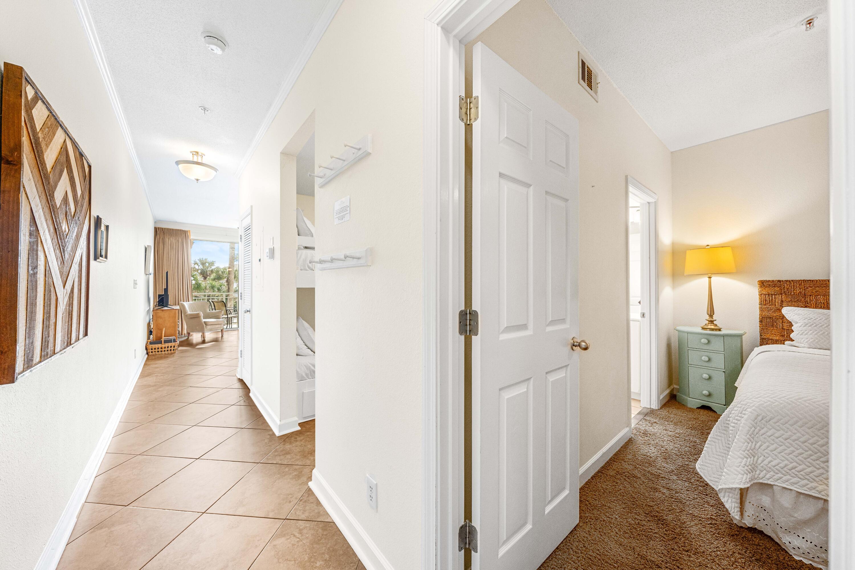 Welcome to your perfect beach getaway! Great Investment Property! This beautifully decorated 2nd-floor condo offers a cozy and inviting space for your family vacation. With 1 bedroom, a bunk area, and 1.5 baths, it comfortably accommodates couples or families looking for a relaxing retreat. Located in the heart of Gulf Place, this condo provides the ultimate convenience. You'll be steps away from charming shops, delicious restaurants, and vibrant entertainment options. Beach access is just across the street, making it easy to spend your days soaking up the sun, playing in the waves, or enjoying stunning sunsets. Take advantage of the fantastic amenities Gulf Place has to offer. Choose from any of the three sparkling pools to cool off, unwind in the hot tub, or try your hand at tennis!