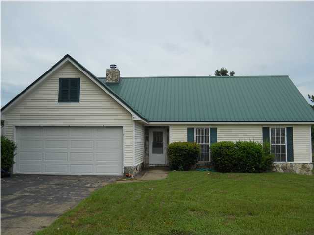 Short Sale! GREAT INVESTMENT PROPERTY! Being sold ''As Is'' South
Crestview. This 3 bedroom 2 bath home comes with additional large 2nd story bonus room, has metal roof which enhance the appeal of this home as well as the enclosed sunroom. 2013 installed ceramic tile flooring thru-out the home with exception to stairway and bonus room that has WW carpet.. New Dish Washer 2014 and Complete new A/C unit in 2016. Conveniently located in the popular Stone Bridge community. And if you have kids, this corner lot home is conveniently located next to the school bus stop. Priced to sell. Worth seeing, worth Owning!