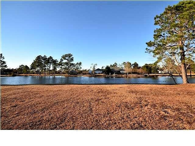 *WATER FRONT LOT available *IN Casa Grande, a sought after community right off I10-Exit 28 Ward Basin Rd *ON Stocked Lake with bass, brim, catfish and crappie for resident's fishing enjoyment only. *Highly Elevated LOT *Established, mature lawn *(2014) Elevation Certificate and Survey provided with purchase (a $5,000. value) *COME BUILD YOUR DREAM HOME!