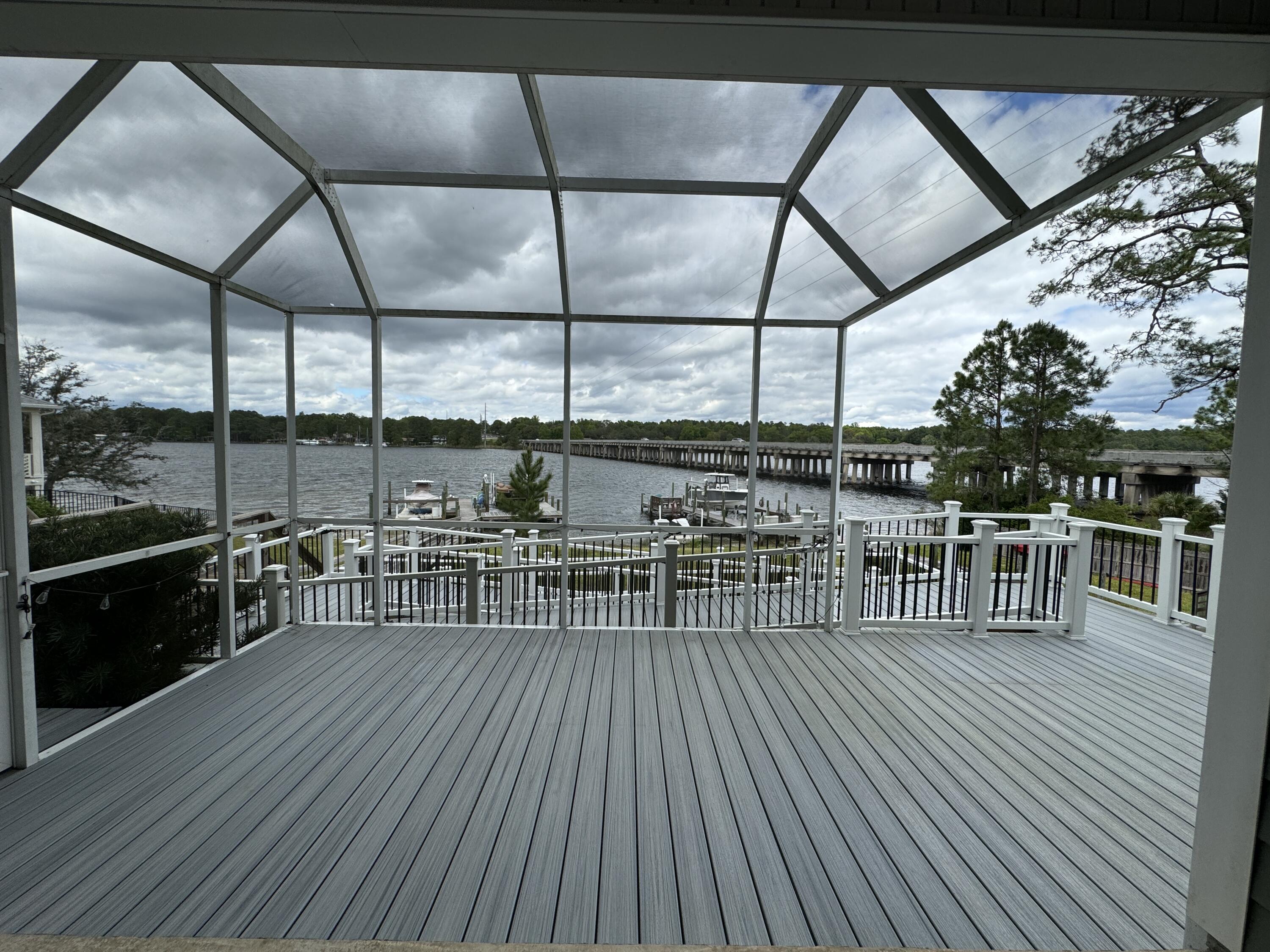 Experience luxury waterfront living in this breathtaking 4-bedroom, 2.5-bath home featuring contemporary finishes and a deep water dock with a boat lift. Imagine starting your mornings with a cup of coffee on the back porch while watching dolphins play in the bayou, and ending your evenings with a glass of wine as the sun sets.

The first floor offers a spacious open-concept layout that seamlessly connects the living room, kitchen, and dining area, all showcasing expansive water views. A convenient half bath is also located on the main level, making it perfect for guests and entertaining.

Upstairs, the primary suite provides a peaceful retreat with beautiful water views, a walk-in closet, and a luxurious en suite bathroom featuring a double vanity, walk-in tiled shower, garden tub,  and a separate water closet. Three additional guest bedrooms share a full bathroom, and the laundry room is also conveniently located on the second floor for added ease.

Pets may be considered on a case-by-case basis with prior owner approval and a non-refundable pet fee. No smoking or vaping is allowed. This home can be rented furnished or unfurnished, offering flexibility to suit your lifestyle.

This exceptional waterfront home offers comfort, beauty, and the perfect setting to enjoy coastal living at its finest.