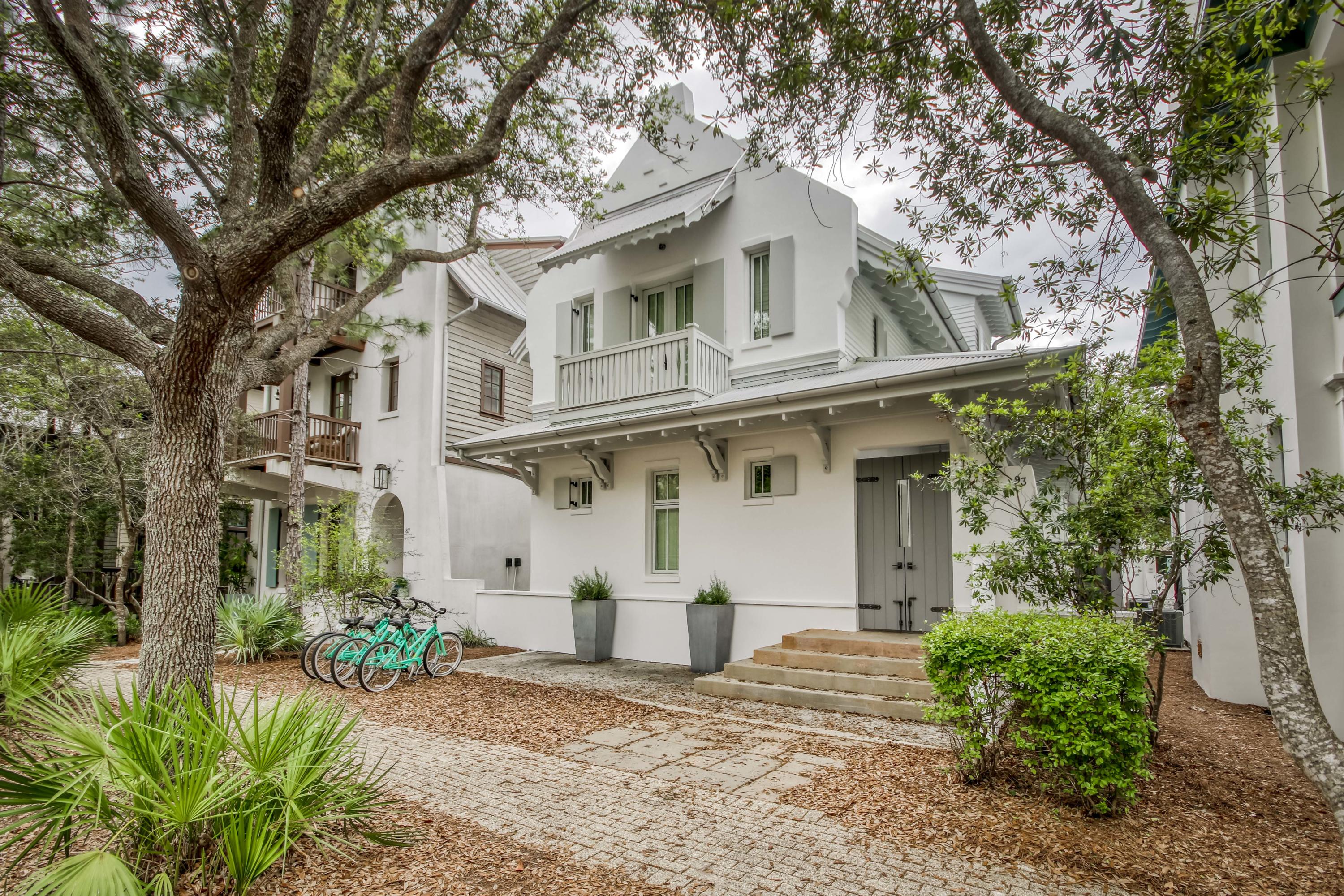 Newly renovated with the finest finishes!
Inspired by nature and designed for comfort, this LEED Platinum certified cottage and detached carriage house, the only of its kind in Rosemary Beach, was built with environmentally-sustainable and energy-efficient materials and recently updated with a thoroughly modern aesthetic. Going green has never felt more luxuriously comfortable and inspiring.
Totally renovated in 2019, this cottage includes new marble countertops throughout; updated bathrooms include glass tile shower surrounds, frameless glass shower doors, new master bathroom cabinetry and plumbing fixtures. The exterior has been newly painted with a white lime-wash finish and a neutral color accent that enhances the tranquility of this cozy cottage. The interior renovations include tongue-in-groove beaded board ceilings and wall accents throughout; Aidan Gray light fixtures and furnishings; and newly refinished bamboo floors that add warmth to the large upstairs bedrooms.
The first floor features a dining area for 8, an entertainment space with large flat screen TV, a lounge area with oversized seating and large flat screen TV, and a SONOS streaming music system accessible through your smartphone or tablet. The kitchen boasts top of the line energy-efficient appliances and bar seating for 4. This floor also holds one of two master bedrooms with king bed, en suite bathroom and its own private outdoor access.
Refinished bamboo steps lead you to the second floor sleeping quarters which include a second master bedroom with a king bed, en suite bathroom, and private balcony and a family suite with a queen bed, en suite bathroom and attached bunk room with 2 full beds that can be closed off for privacy.
And when it's time to relax, enjoy the tranquil sounds drifting from a private SONOS streaming music system in each sleeping space. Or step outside to the soothing fountains found in your private courtyard with outdoor grill.
Features

" SONOS Streaming Music System Throughout
" Lounge & Conversation Areas on 1st Floor
" 1st Floor Master Bedroom (King Bed) with En suite
" 2nd Floor Master Bedroom (King Bed) with En suite
" 2nd Floor Family Suite (Queen Bed & 2 Full Bunk Beds) with En suite
" Bedding: 2 Kings | 1 Queen | 2 Full (Bunk Beds)
" Steps to Cabana Pool
" Private Courtyard
" Certified LEED Platinum Construction
" Stainless Steel, High Efficiency Appliances

Information contained within this listing such as square footage, is deemed to be accurate but is not guaranteed. Buyer to verify.