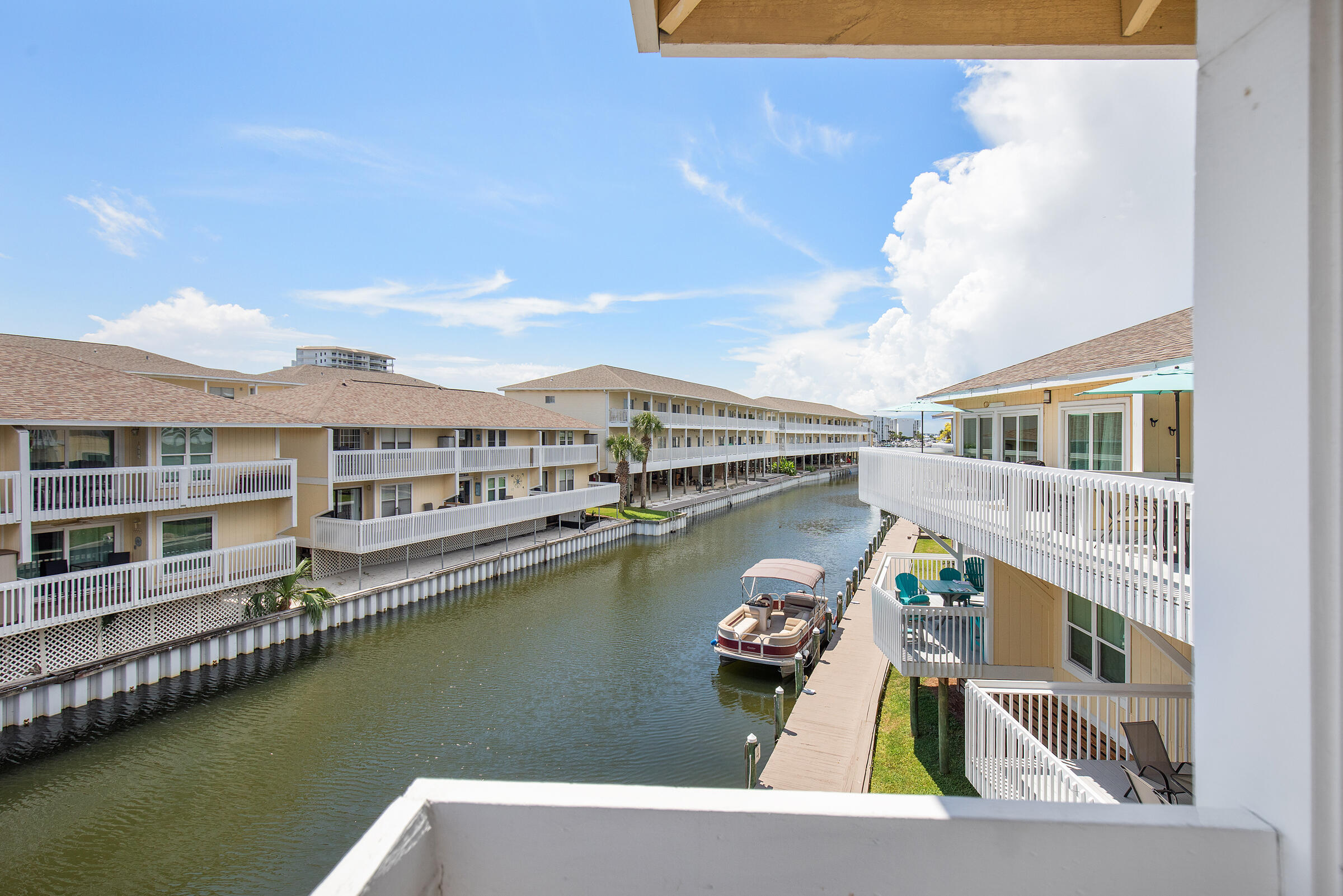 Beautifully updated canal front condo in Sandpiper Cove. This unit is turn key and ideal for a primary residence, vacation getaway, or rental investment. Recent updates include new laminate flooring, fresh interior paint, smart TVs in the living room and bedroom, a memory foam mattress, and an in unit washer/dryer. Two newly added bunk beds increase the sleeping capacity from 4 to 6, maximizing rental potential.

Enjoy sunset views from the private deck while watching boats pass along the canal. Located within Sandpiper Cove, a gated, low density resort in the heart of Destin, owners enjoy 1,100 feet of private beachfront with seasonal beach service. Community amenities include 5 pools, 6 tennis courts, a 9-hole par-3 golf course, pickleball, canal docking and marina slip leasing!